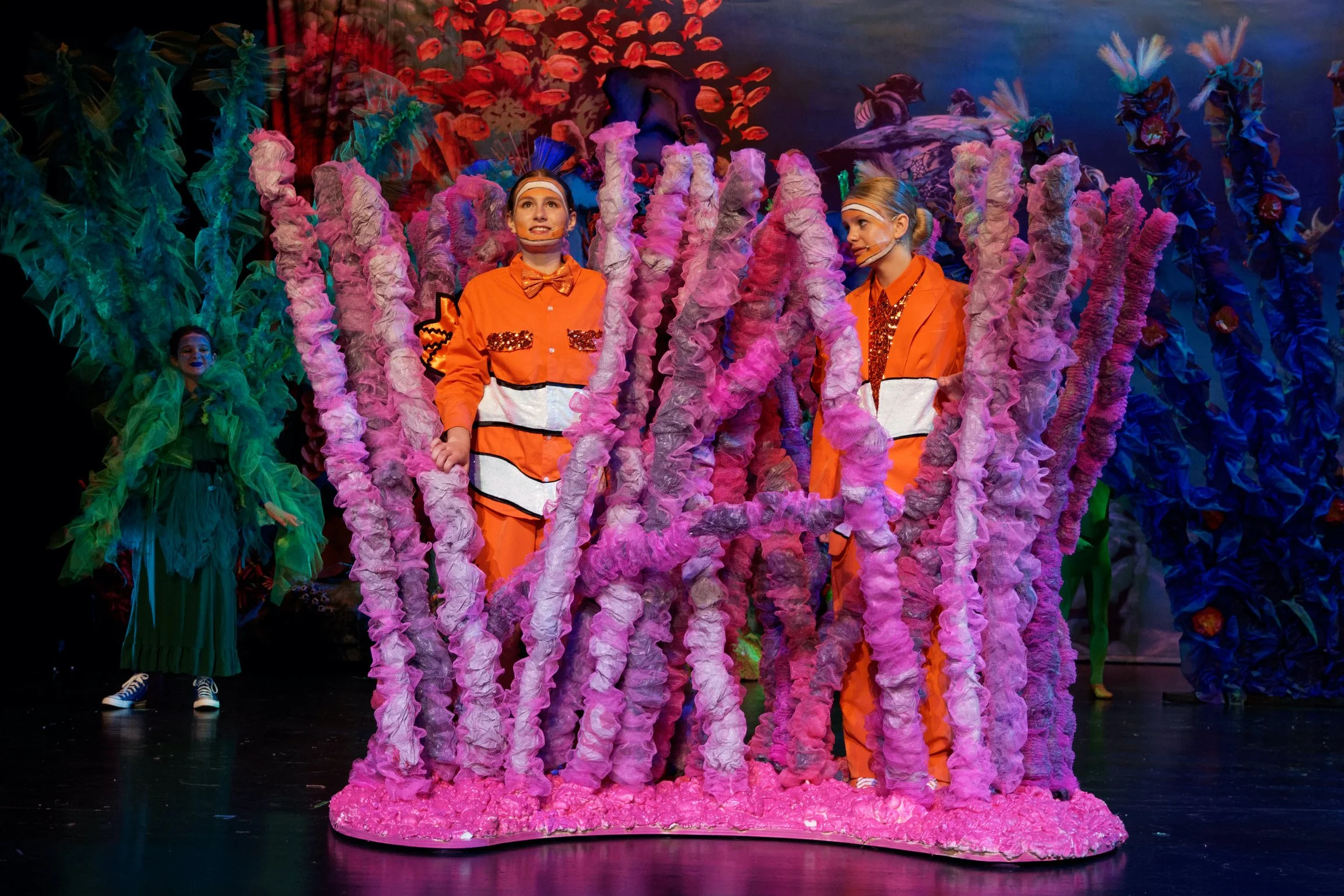 Theaters performers on stage dressed as Nemo and Marlin in "Finding Nemo JR" at The Wortham Center for the Arts in downtown Asheville. Join Dory and friends as they "Just Keep Swimming". See Crush and the Professor Ray on the stage. High-quality, pro