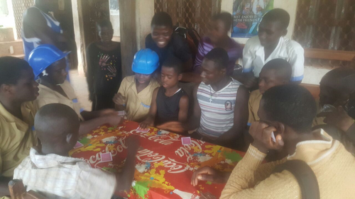 Celebrating!: 
After a hard day's work building a new primary school, students at GTC Waindu celebrate with a Cameroonian card game favorite called Check, which is very similar to Uno in the US.

Apr 6, 2016