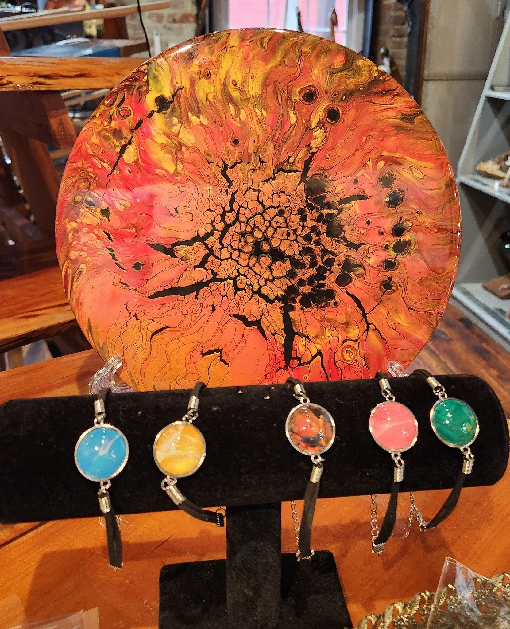 Colorful resin piece and unique jewelry created by artist Bill Frederick, located at the Community Art Center of Switzerland County in Vevay, Indiana