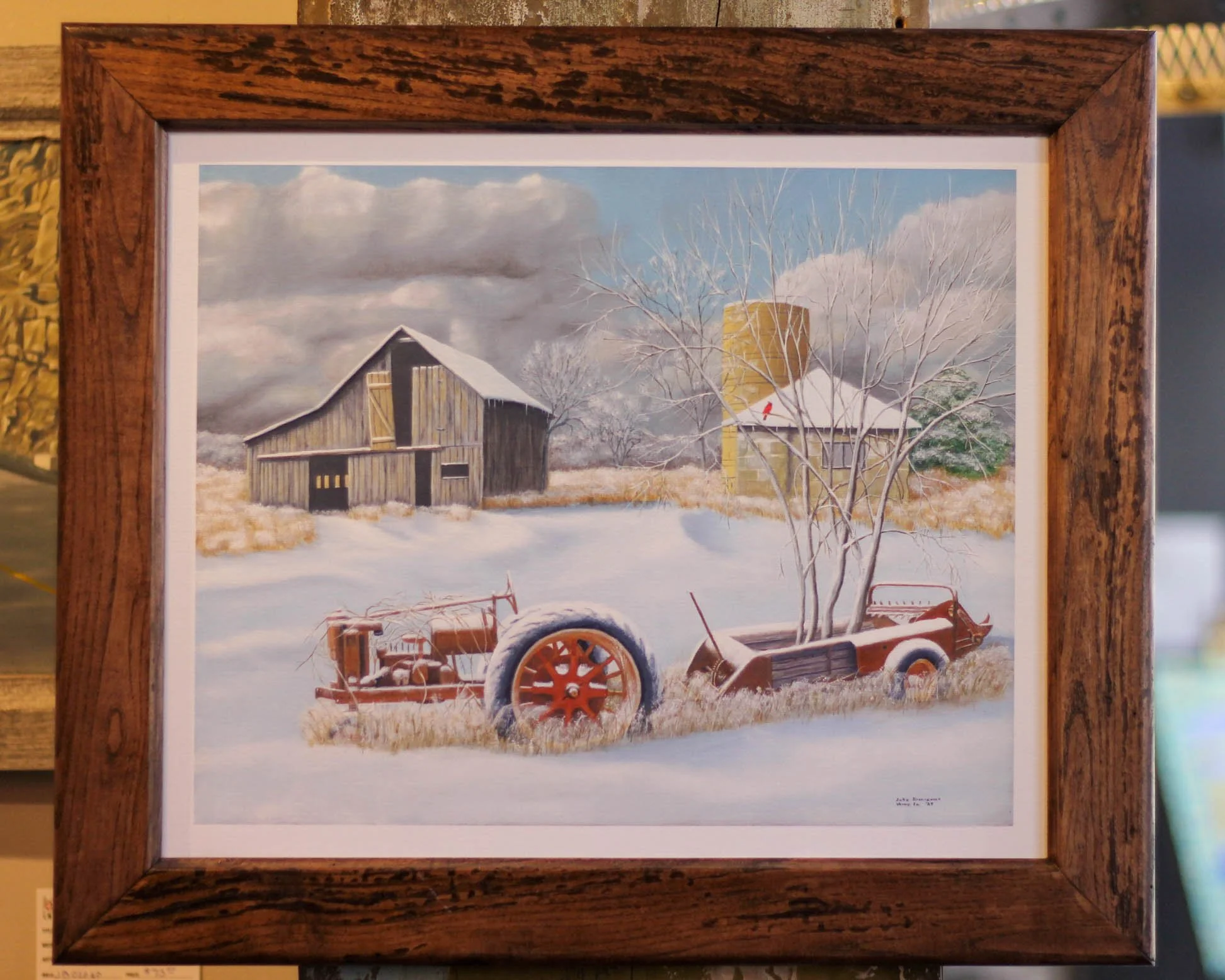 A painting of a winter farm scene featuring an old abandoned tractor with a tree growing through its middle, a barn, a silo, and a snow-covered landscape under cloudy skies.