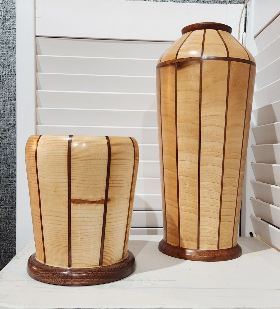 Beautiful turned wooden vessels created by artisan woodturner Lou Cougill, located at the Community Art Center of Switzerland County in Vevay, Indiana