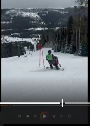 Video submitted for review of a snowboarder tethering a bi ski with fixed outriggers