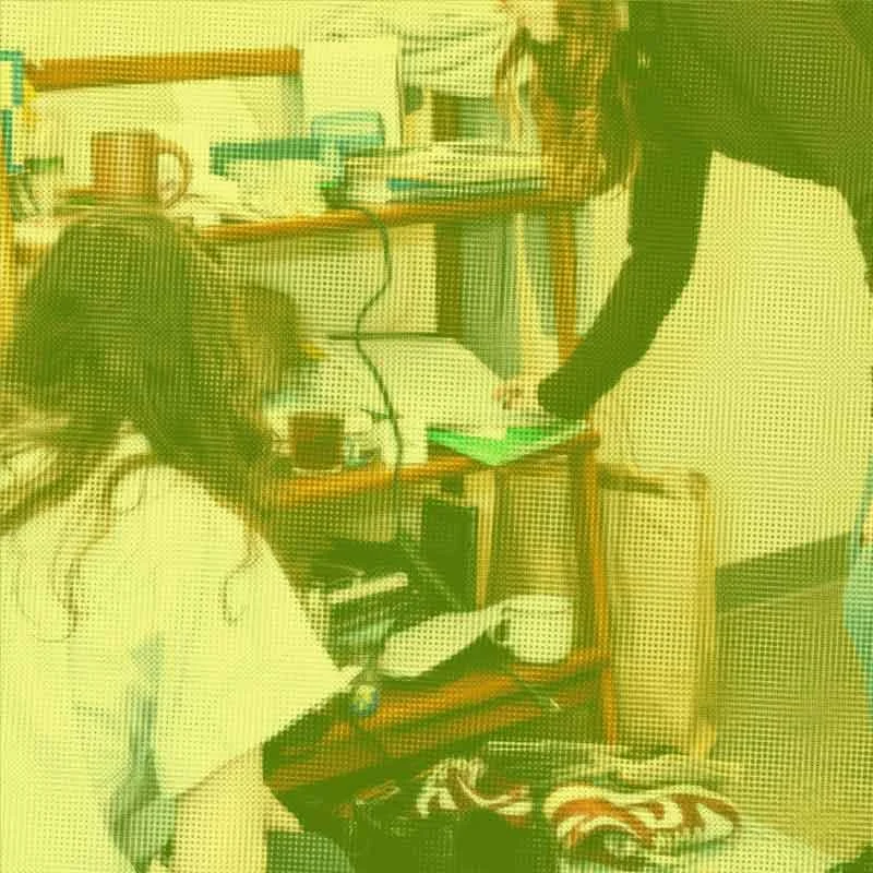 Philadelphia-area Decluttering therapist Molly Marcus in session w/her client, beginning to clear and organize the piles of clutter.