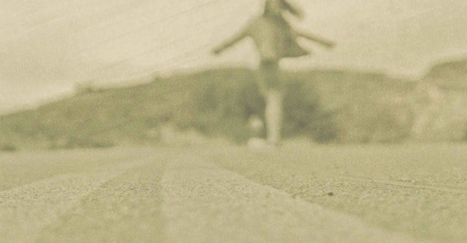 Woman twirling around on a road, her arms out wide, represents how ADHD therapy in Philadelphia can help you feel more self-acceptance & confidence.