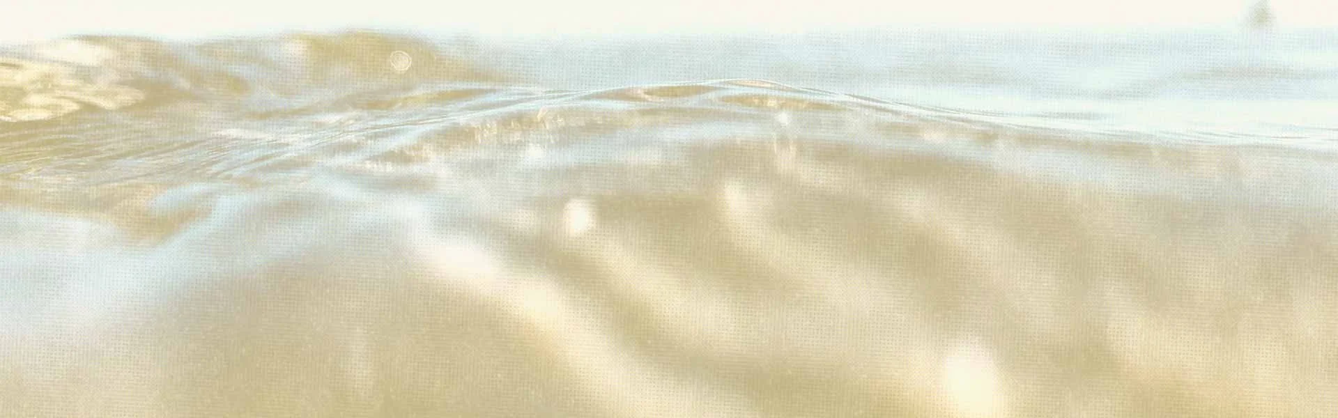 Faded halftone close-up of gentle ocean waves, represents how life changes & loss can feel like being at sea in your life.