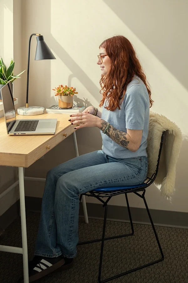 Therapist & coach Molly Marcus having an online session with a client.