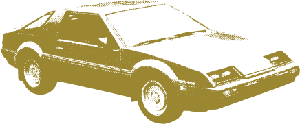 Gold-colored vintage 1980s sports car viewed from a three-quarter front angle.