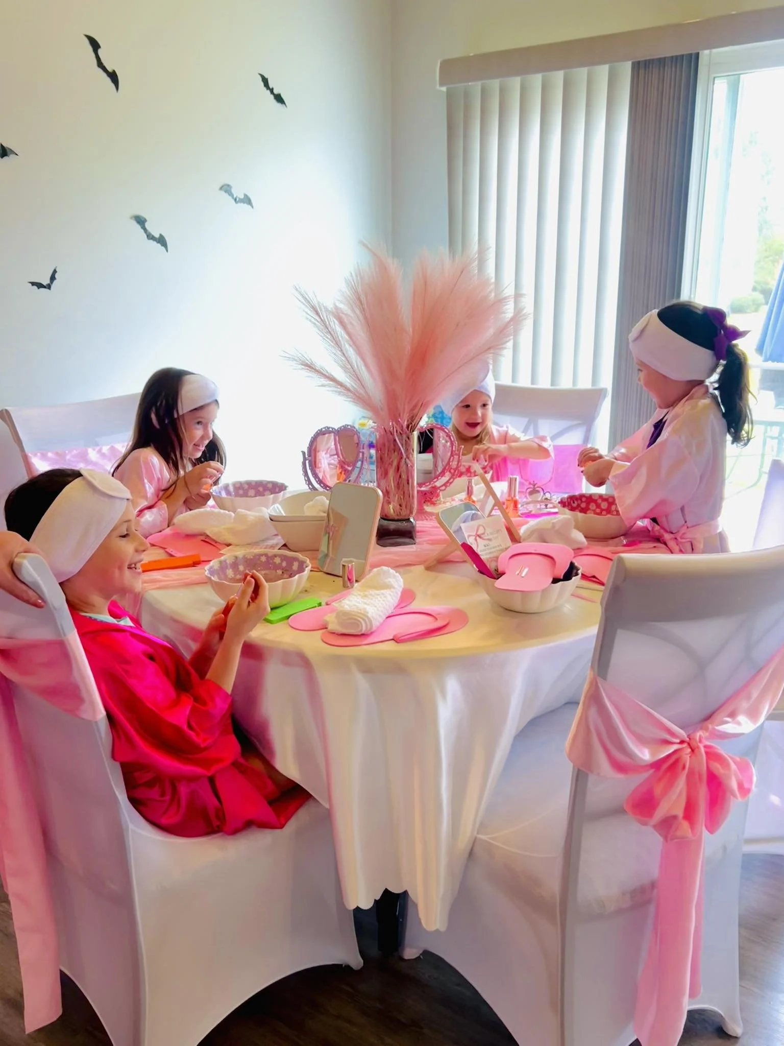 <img src="girls-manicure-station.jpg" alt="Girls enjoying manicures at a Cutecumber spa birthday party in South Carolina">