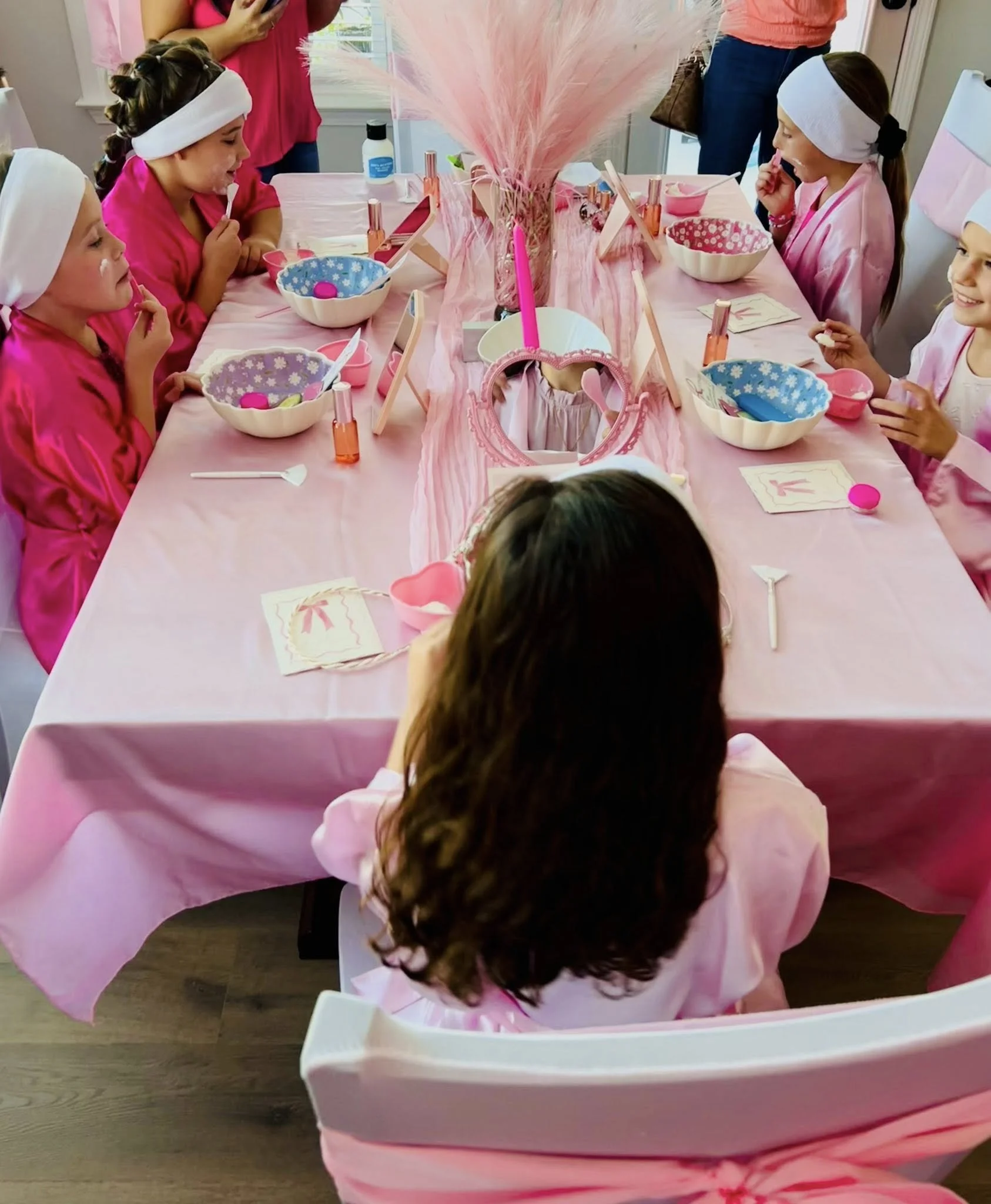 <img src="girls-manicure-station.jpg" alt="Girls enjoying manicures at a Cutecumber spa birthday party in South Carolina">