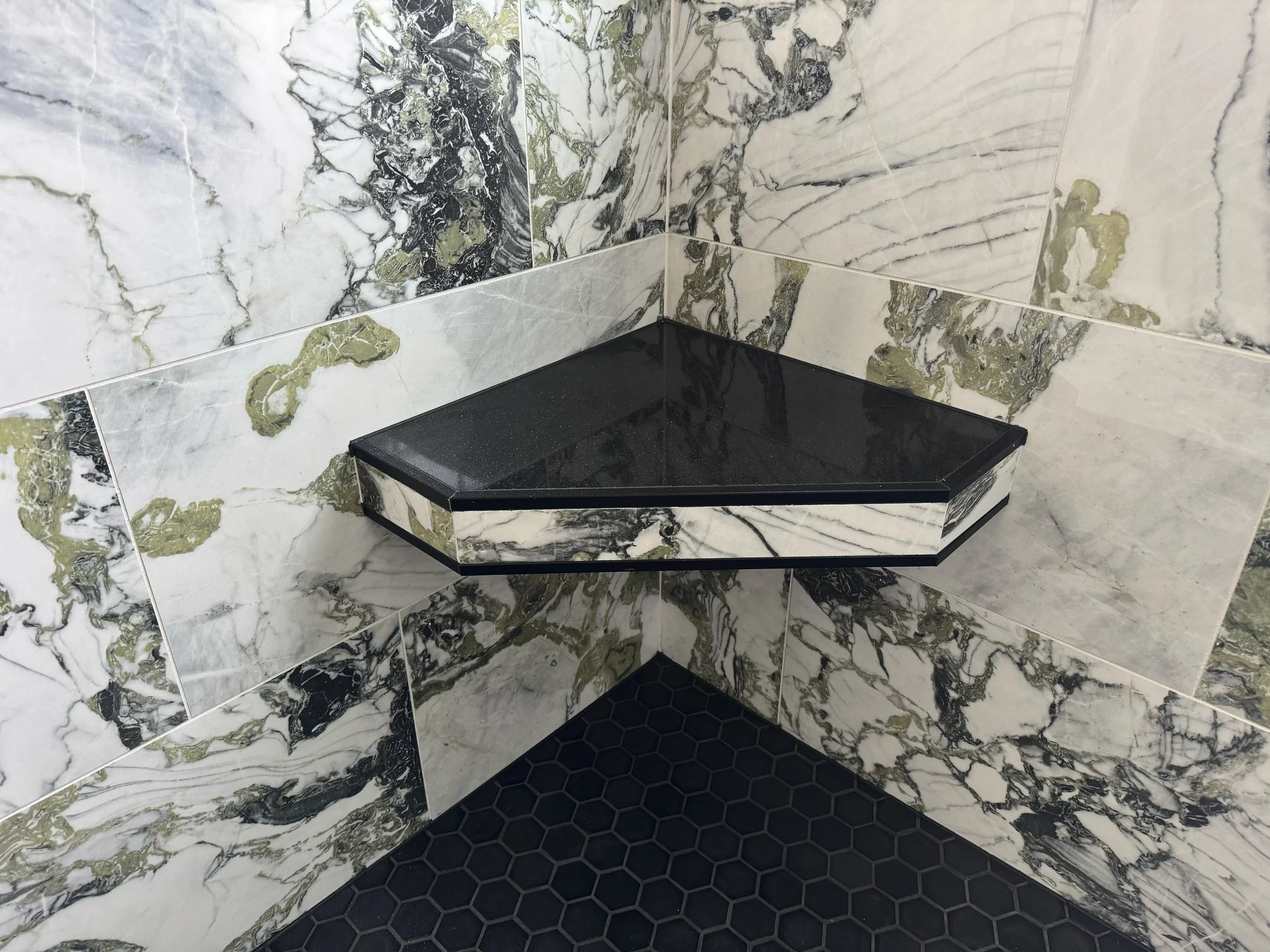 Master Bathroom Update - Modern Finishes.
Black trim accents, custom shelvings, and build-in bench, with full painting and new trim installation. 