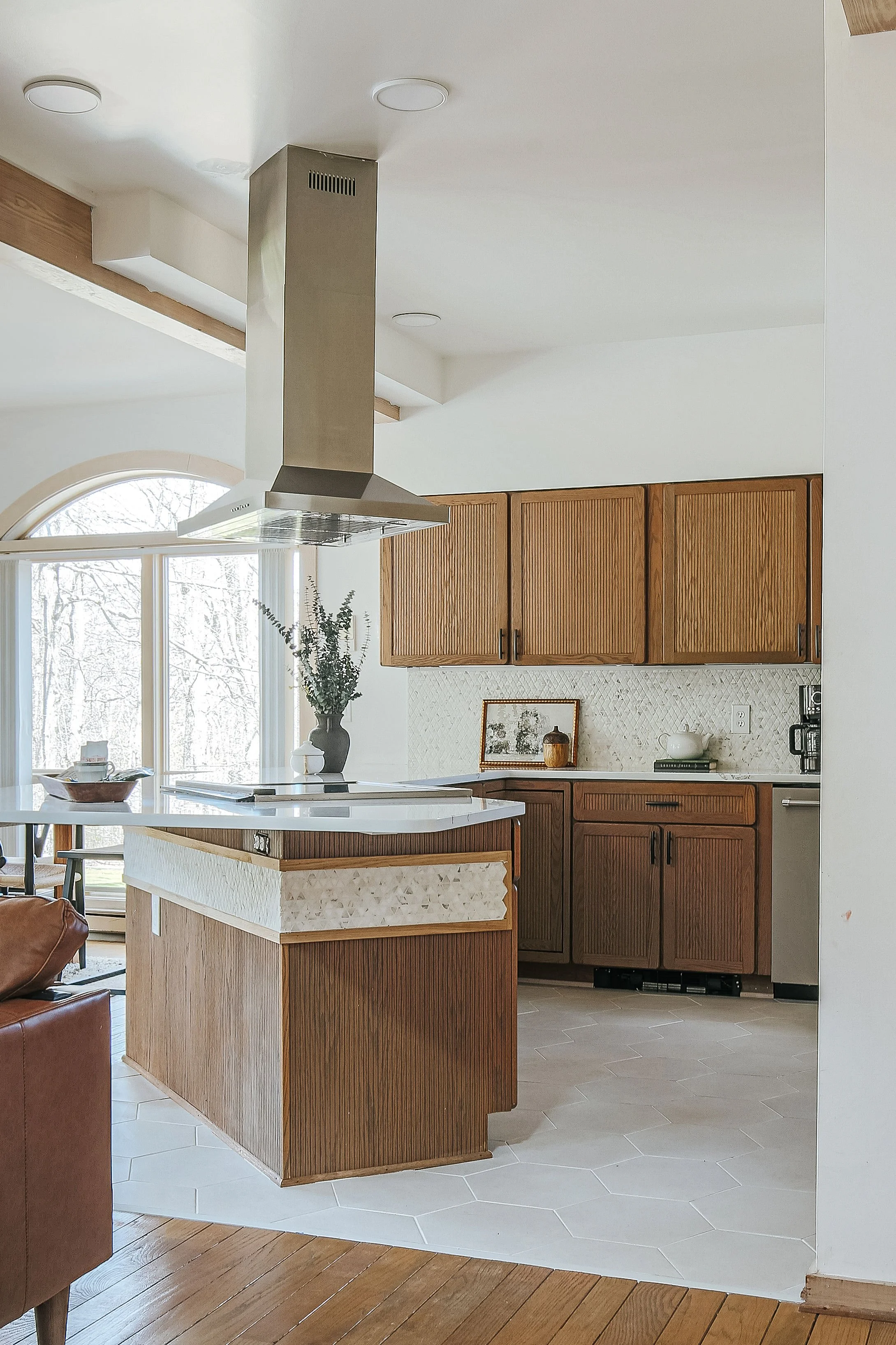 Kitchen Update- Full Refresh. 
New tile flooring updated countertops, backsplash installation, and new faucet for clean, modern finish.