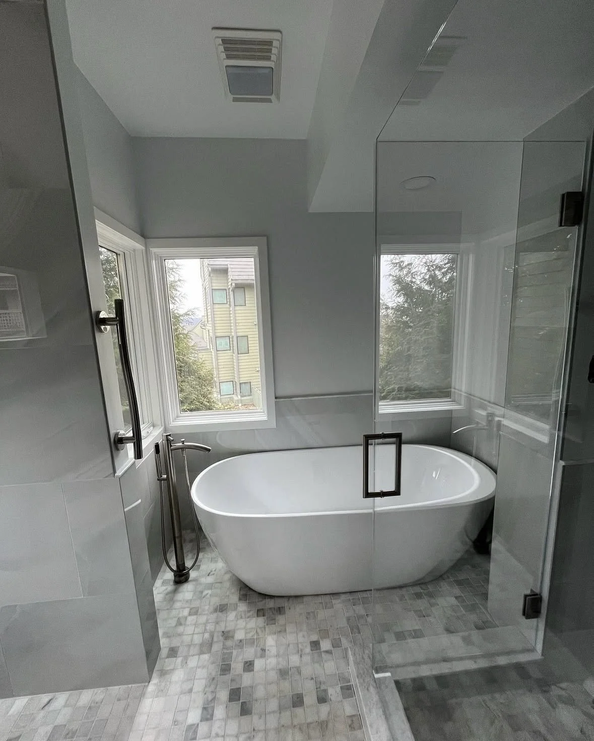 Master Bathroom Renovation - Wet Area.
Converted a large tub area into a spacious 7'x8' walk-in shower with a vessel tub for a modern look. 