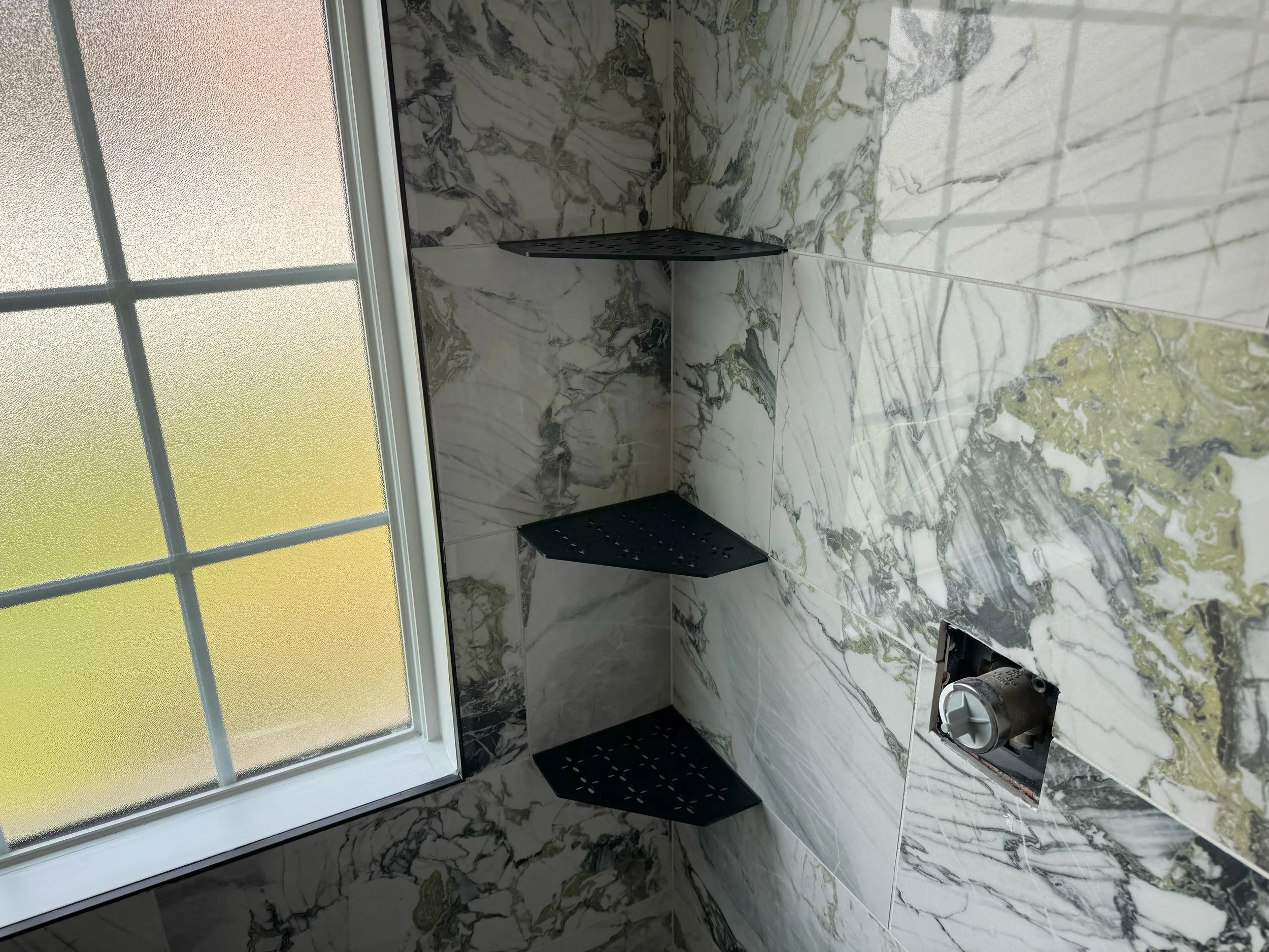 Master Bathroom Update - Modern Finishes.
Black trim accents, custom shelvings, and build-in bench, with full painting and new trim installation. 