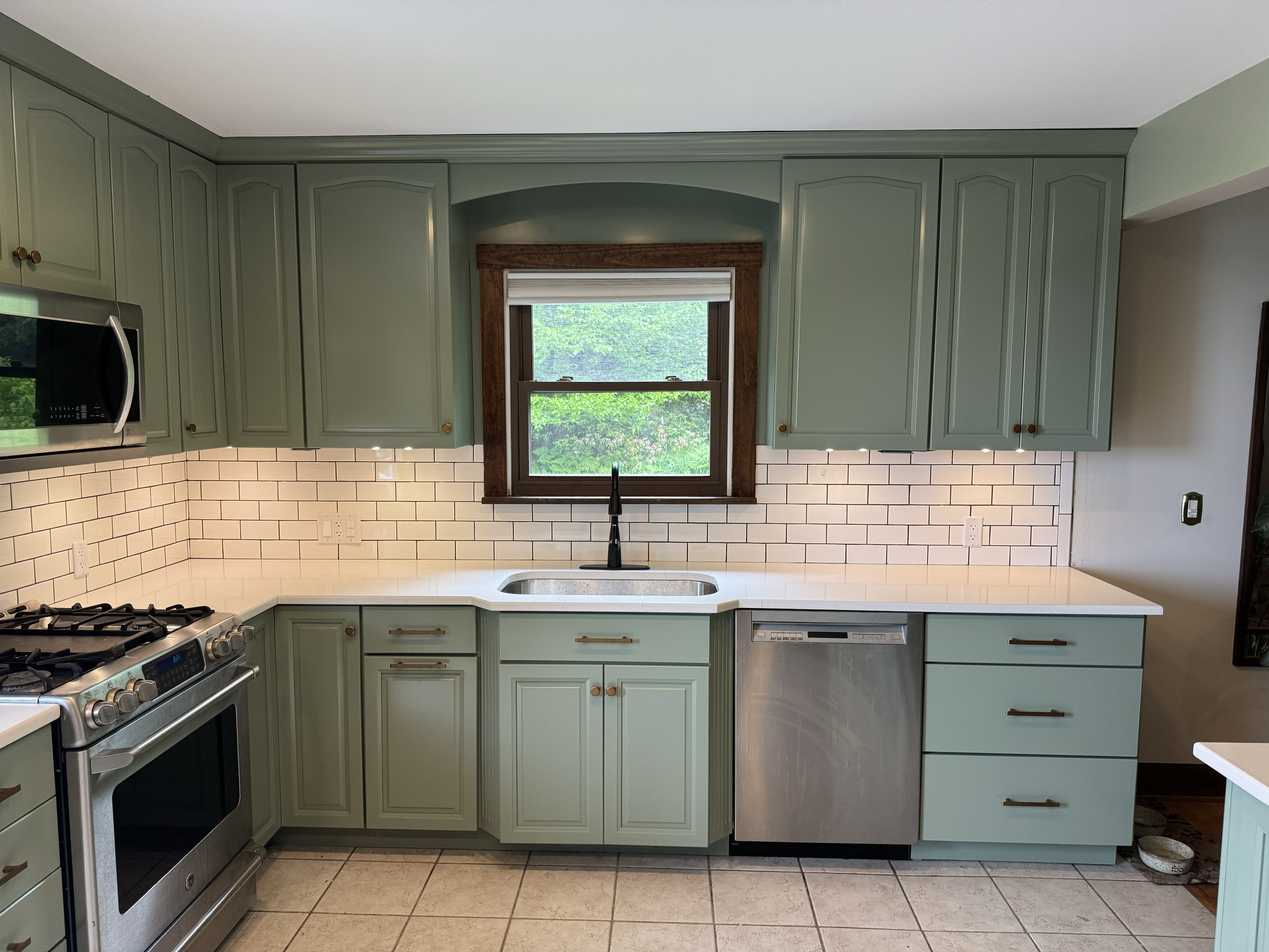 Kitchen Update- Cabinet Refresh.
Refinishing cabinets with new controls and backsplash for a clean, modern upgrade. 