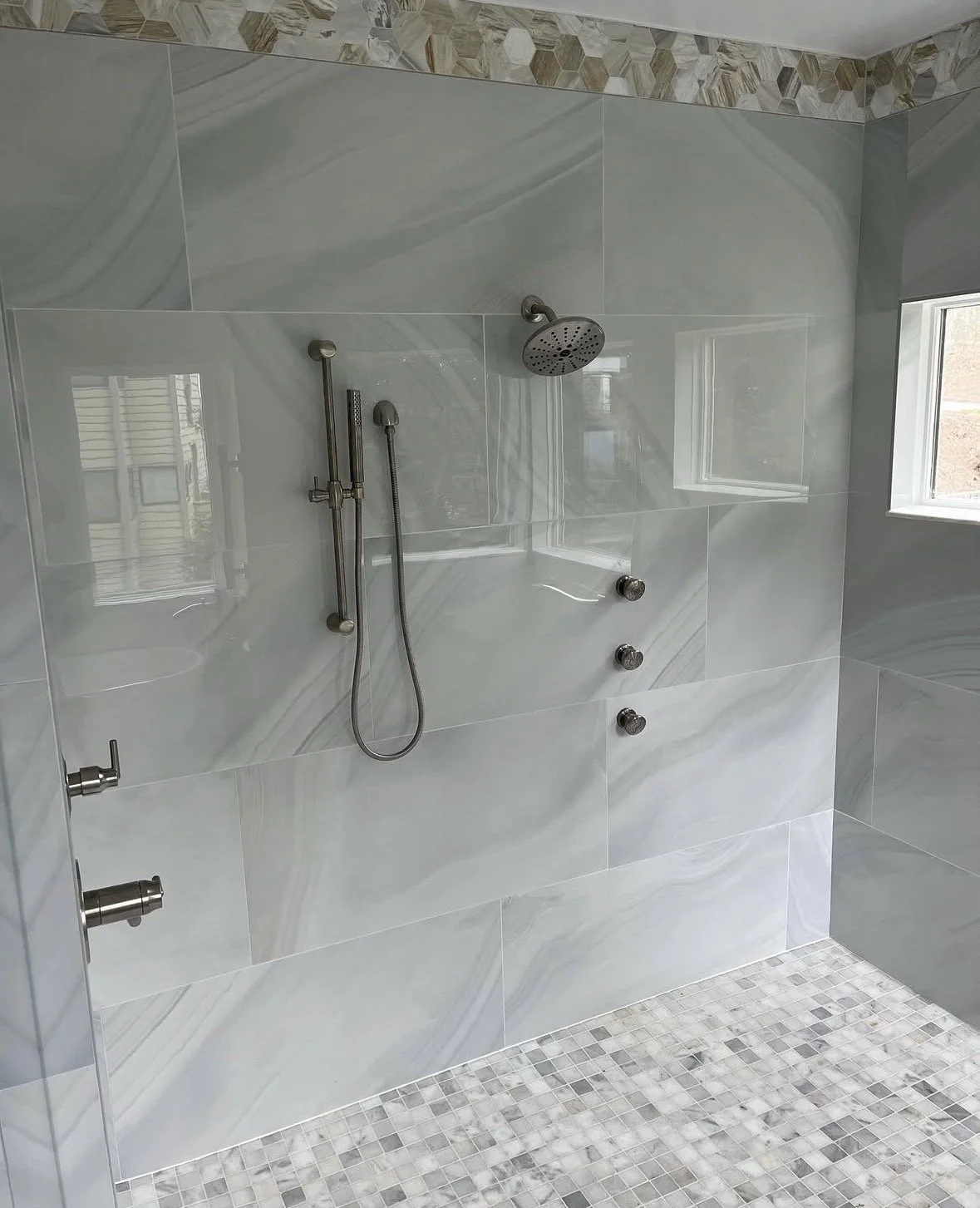 Master Bathroom Renovation - Wet Area.
Converted a large tub area into a spacious 7'x8' walk-in shower with a vessel tub for a modern look. 