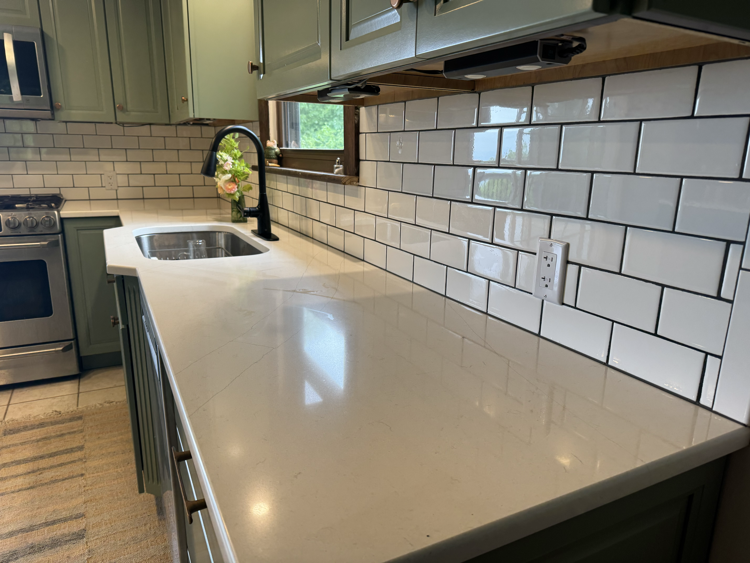 Kitchen Update- Cabinet Refresh.
Refinishing cabinets with new controls and backsplash for a clean, modern upgrade. 