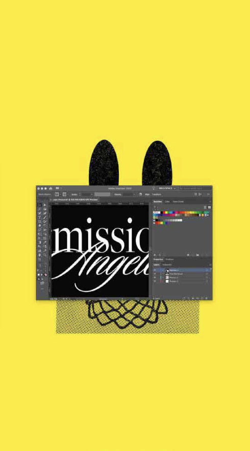 Yellow background with black bunny ears, black nose and mouth, dressed in black, holding a Photoshop window with the text "mission angels" in white script font.