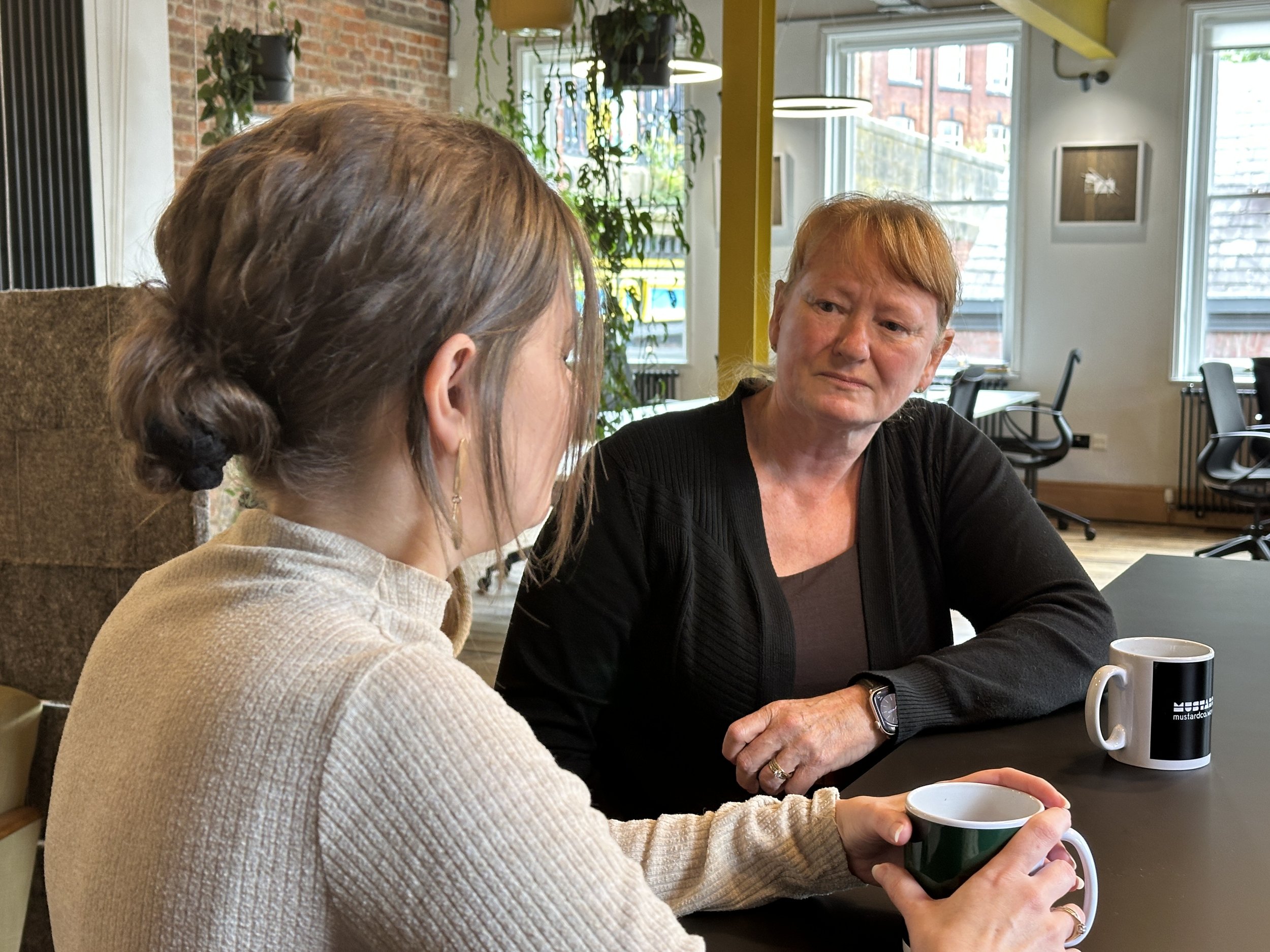 professional woman in conversation with Jac listening