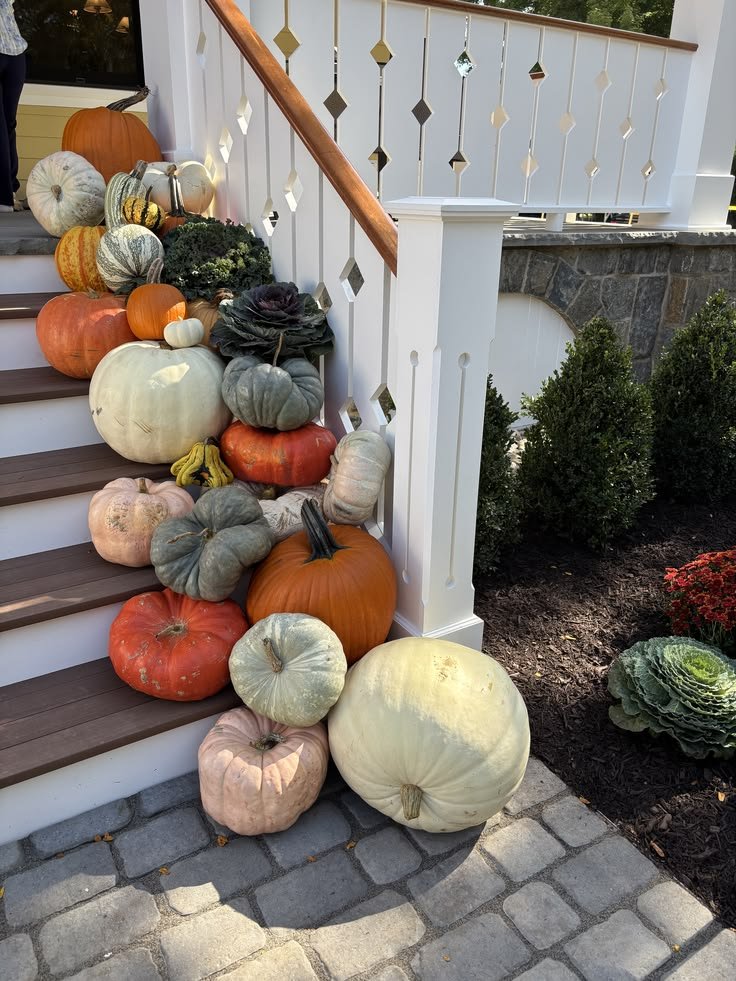 fall pumpkins on front porch.jpeg