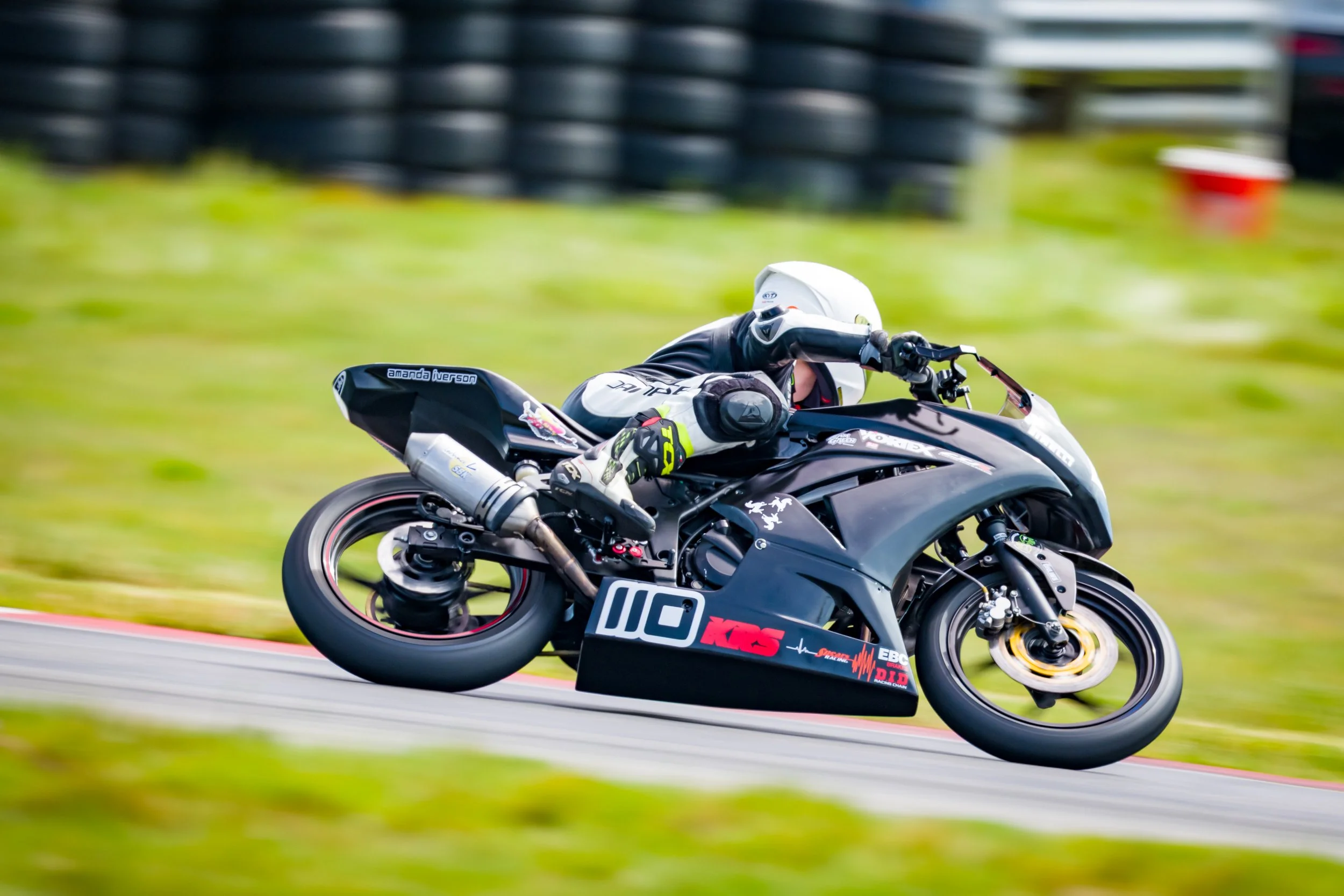 Amanda on motorcycle racing. Photo by Stevens Foto, all rights reserved.
