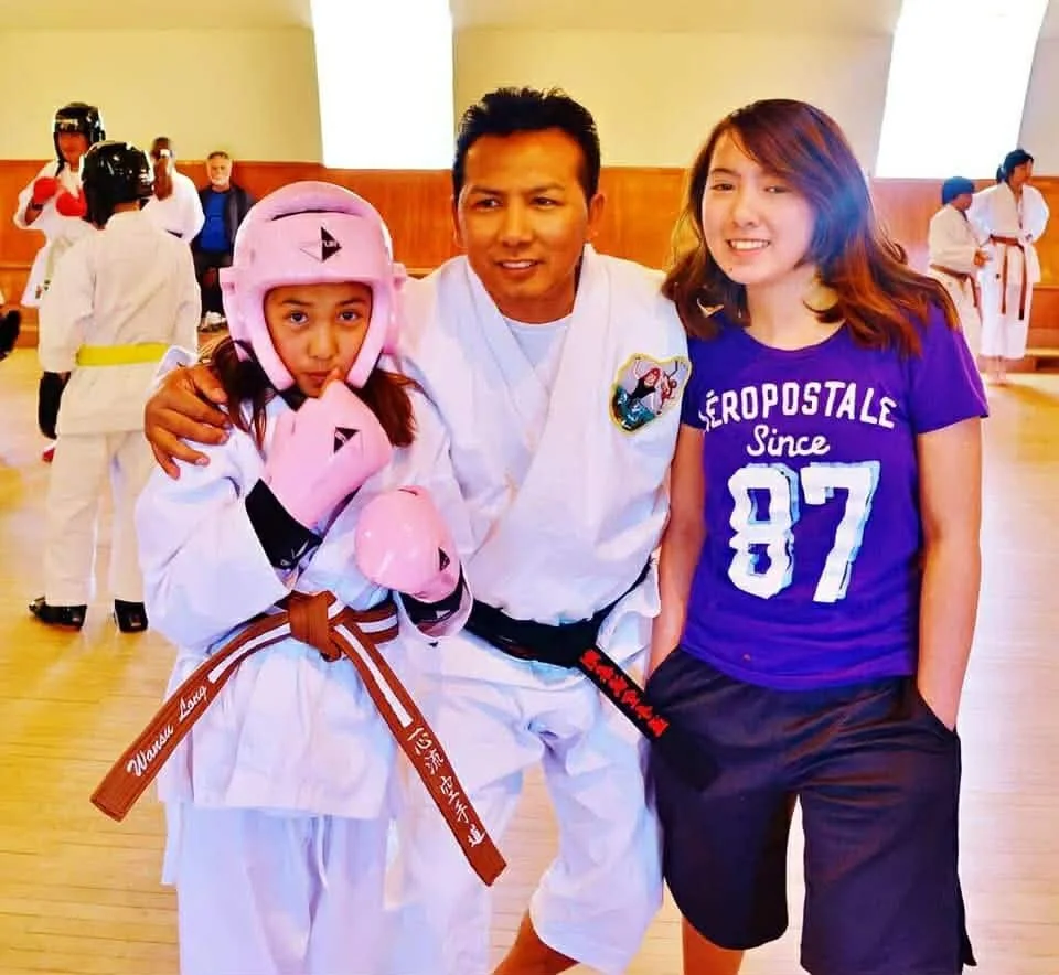 Sensei Danh with his two daughters Bethany (Left) and Darcy (Right) at her tournament