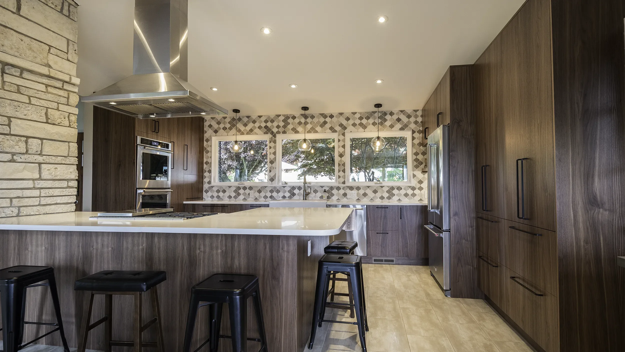 transitional-modern-seattle-kitchen-with-rustic-accents-rich-walnut-cabinets-black-hardware.webp