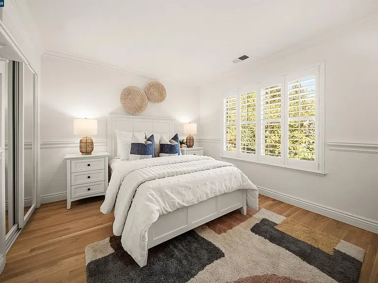 133-sunhaven-danville-guest-bedroom-white-bedding.webp