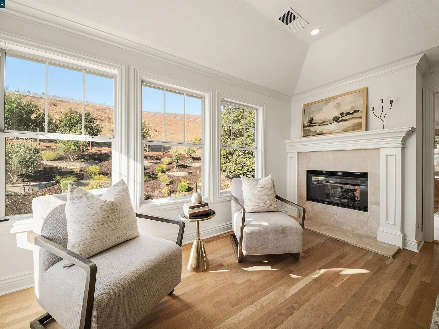 133-sunhaven-danville-primary-suite-sitting-area-fireplace.webp