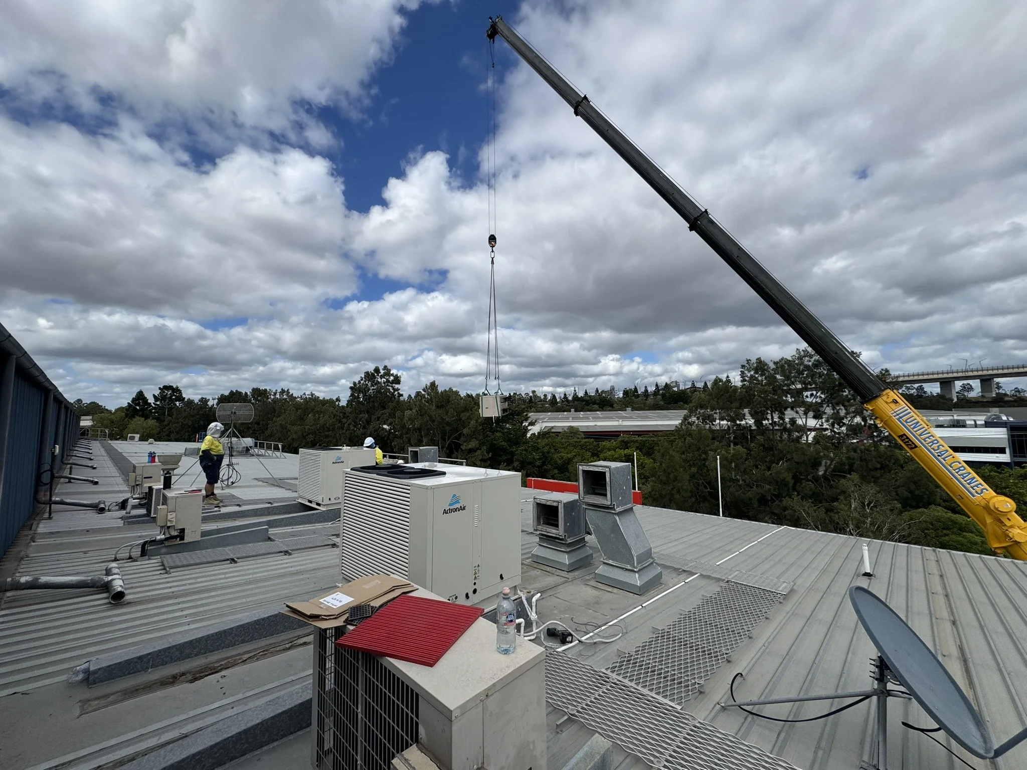New unit being crane lifted up in Brisbane.