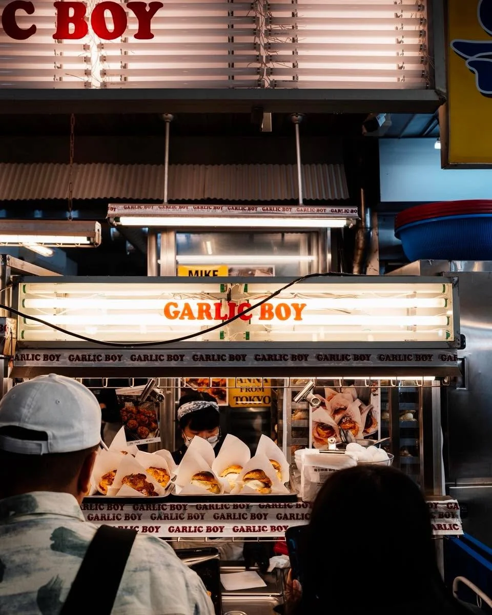 Modern Korean culture operates on a flawless high-low frequency. You catch the neon glow of a 7-Eleven before diving into the engineered speed of the Metro. You surface in Gwangjang Market for the chaotic, unapologetic hustle of a 'Garlic Boy' street