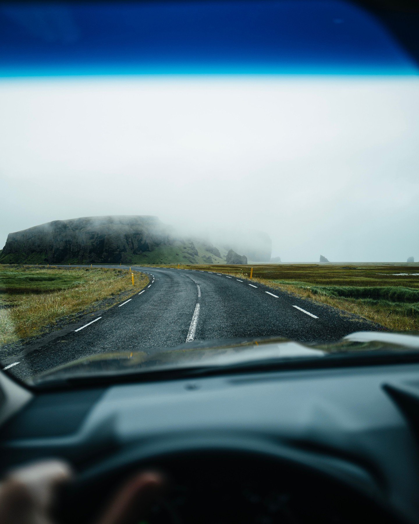 Redefining the road trip where the earth dissolves into the ether. 

Cocooned in luxury, you navigate the velvet fog of Highway 1 as volcanic peaks drift in and out of view like ancient secrets. It is a masterclass in cinematic stillness, designed fo