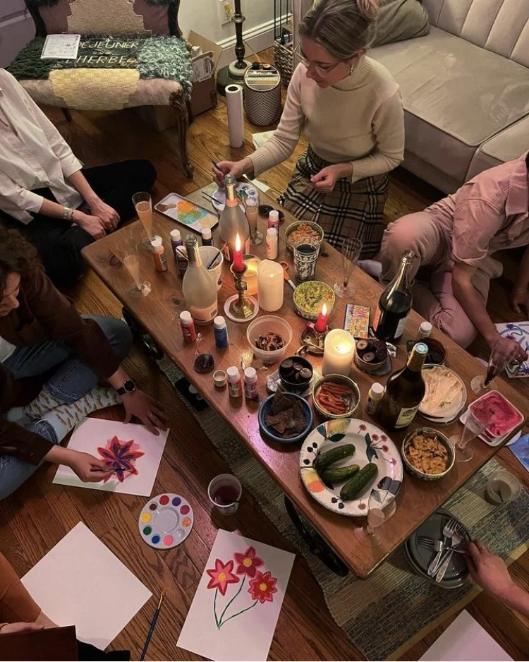 Facilitating painting lessons with friends, 2022.