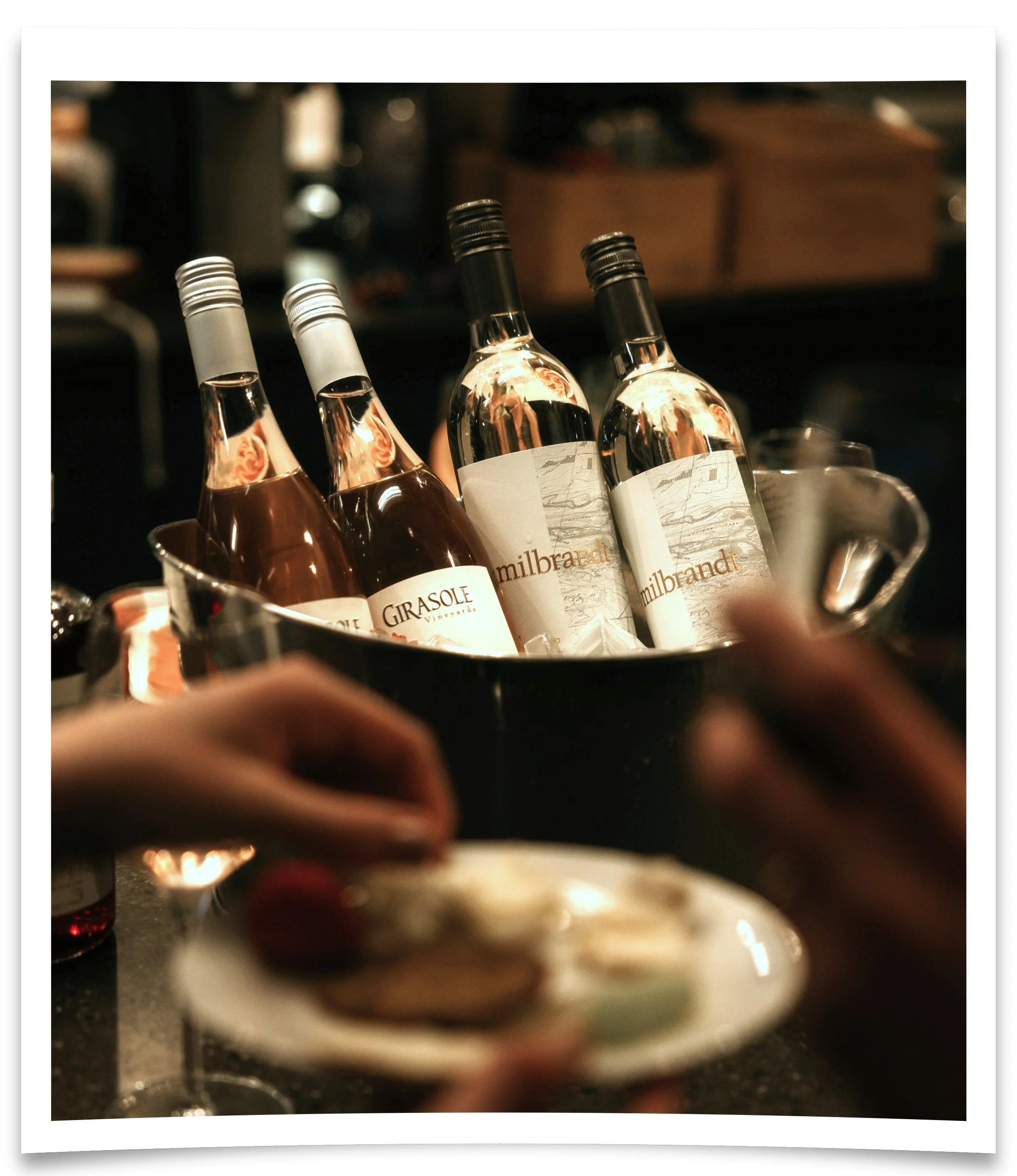 Four bottles of wine in a wine bucket