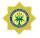 South African Police Service emblem with a yellow starburst and green central figure holding a spear and a shield.
