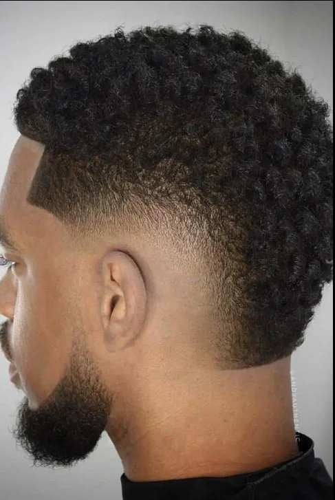 Burst Fade (South of France Style):
A stylish fade that curves around the ear, leaving volume at the crown. This modern, edgy look adds personality while keeping the sides clean and sharp.