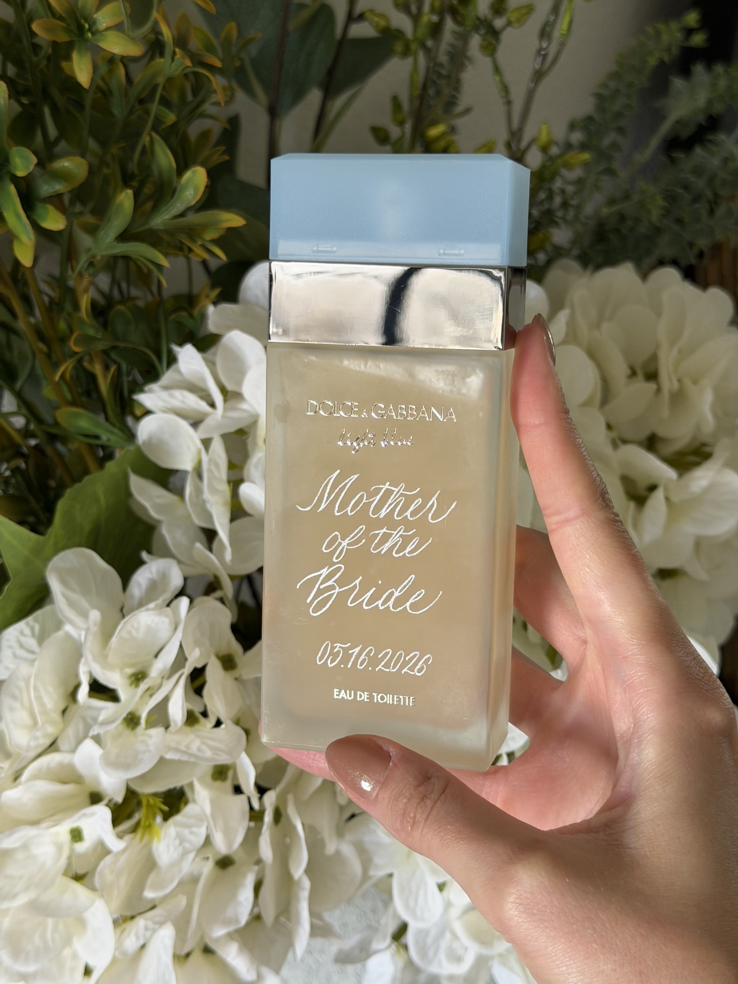 Mother of the Bride fragrance bottle hand engraved with a wedding date and custom lettering.