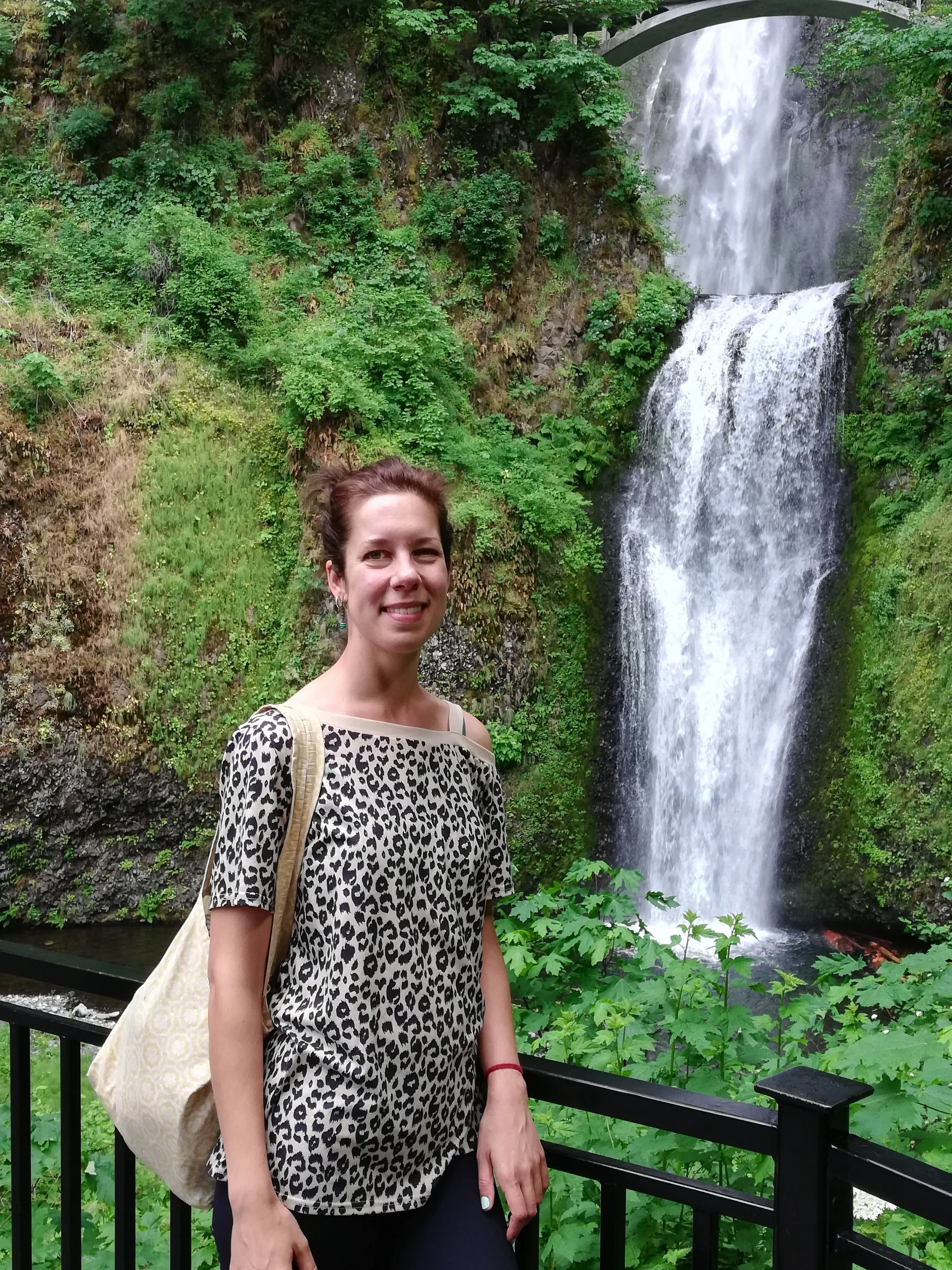 Carla in front of a waterfall