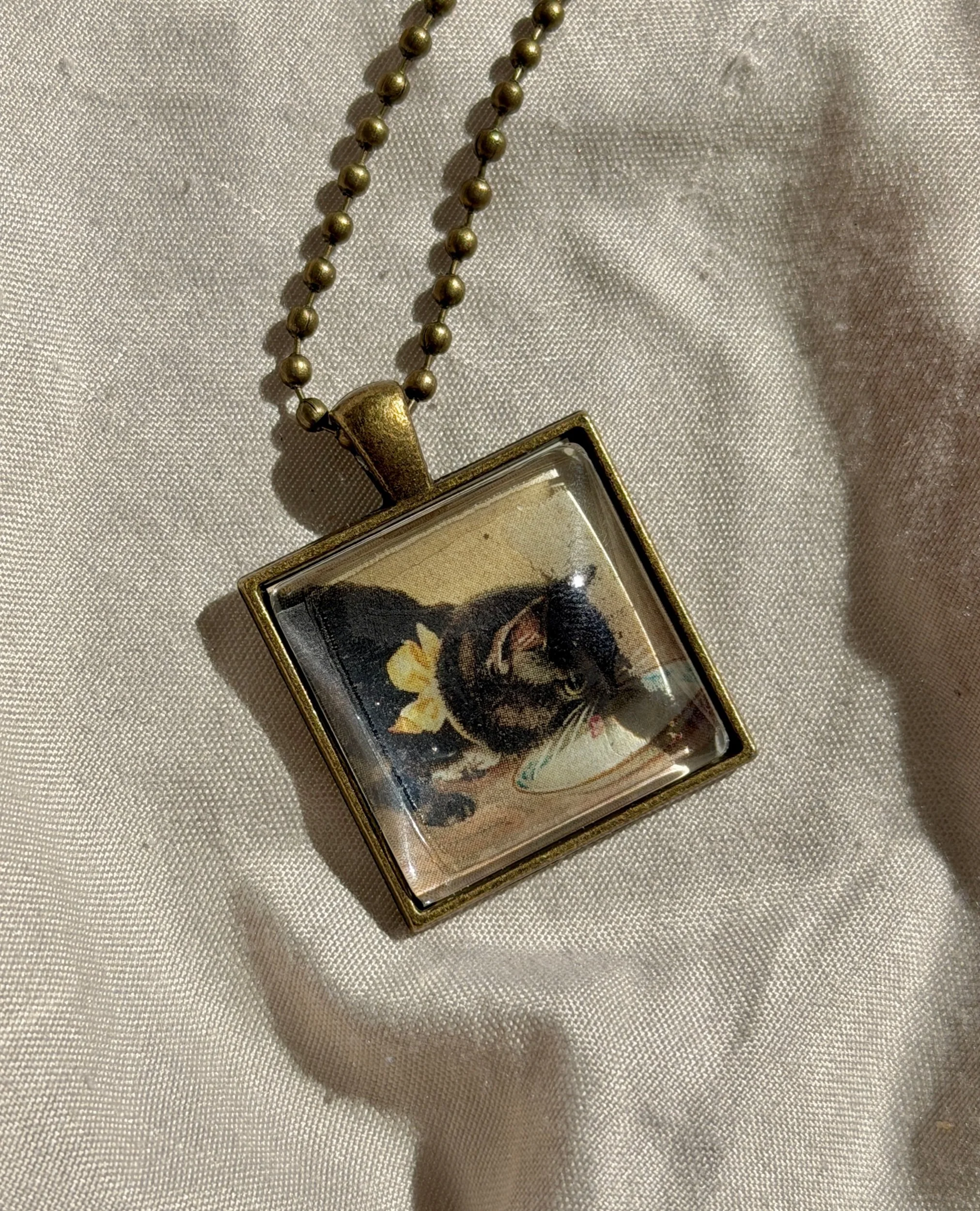 Glass Kitty Drinking Milk Necklace