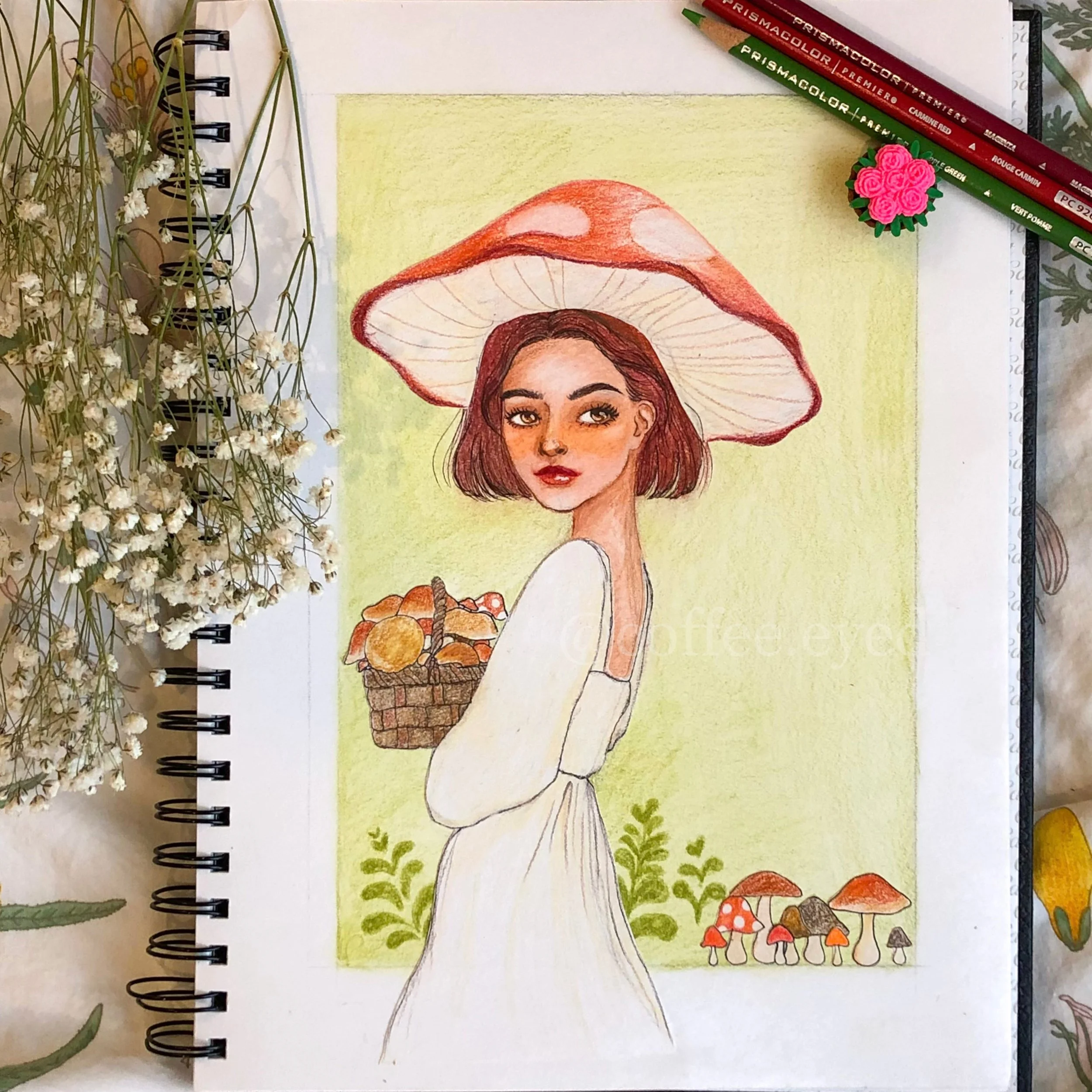 A colored sketch of a young woman with short brown hair, wearing a long white dress, holding a basket of mushrooms, and wearing a large mushroom cap as a hat, depicted in a nature setting with small mushrooms at the bottom.
