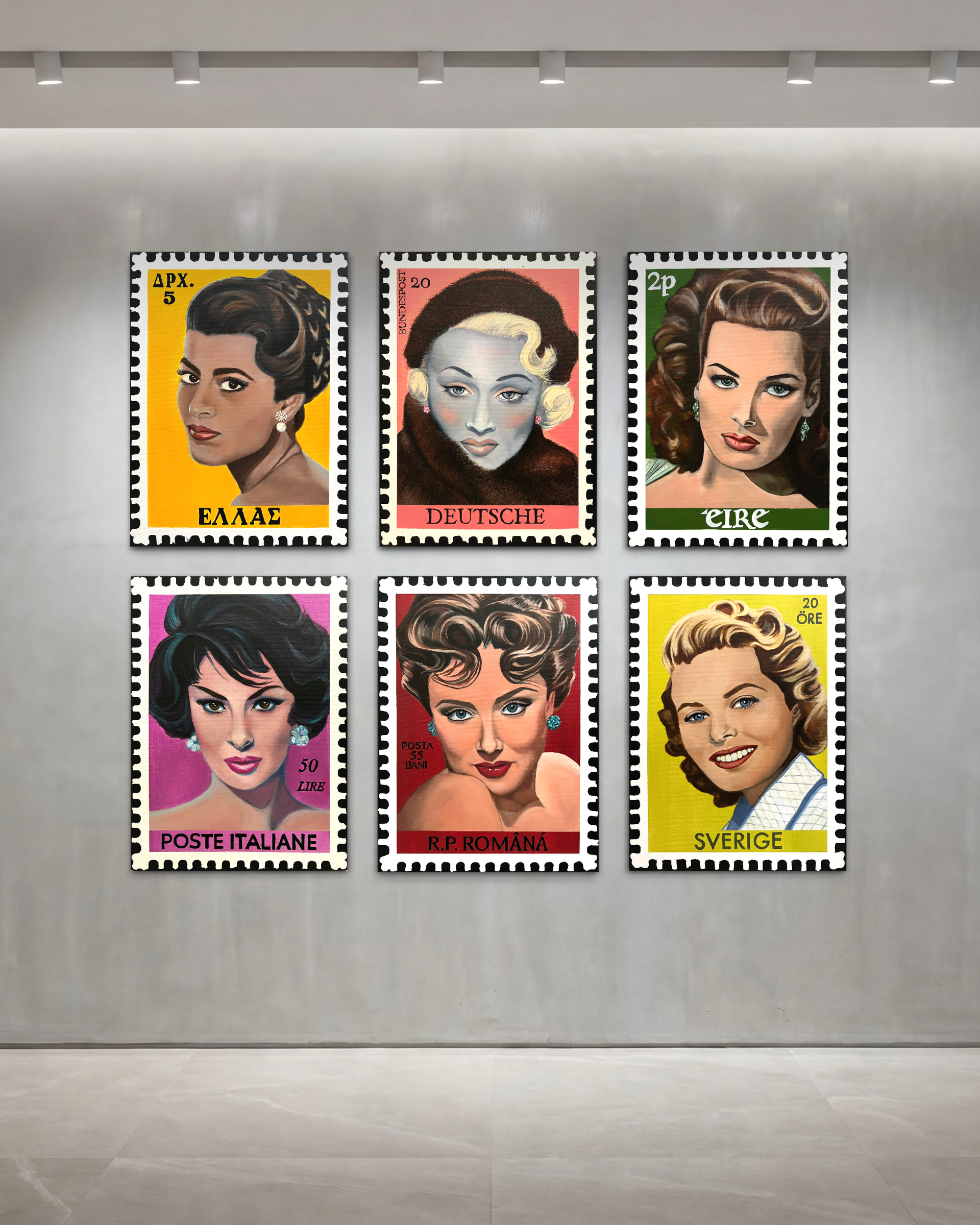 Display of six vintage postage stamp posters featuring illustrated portraits of women with various hairstyles and facial expressions, labeled with country and denomination, arranged on a light-colored wall.