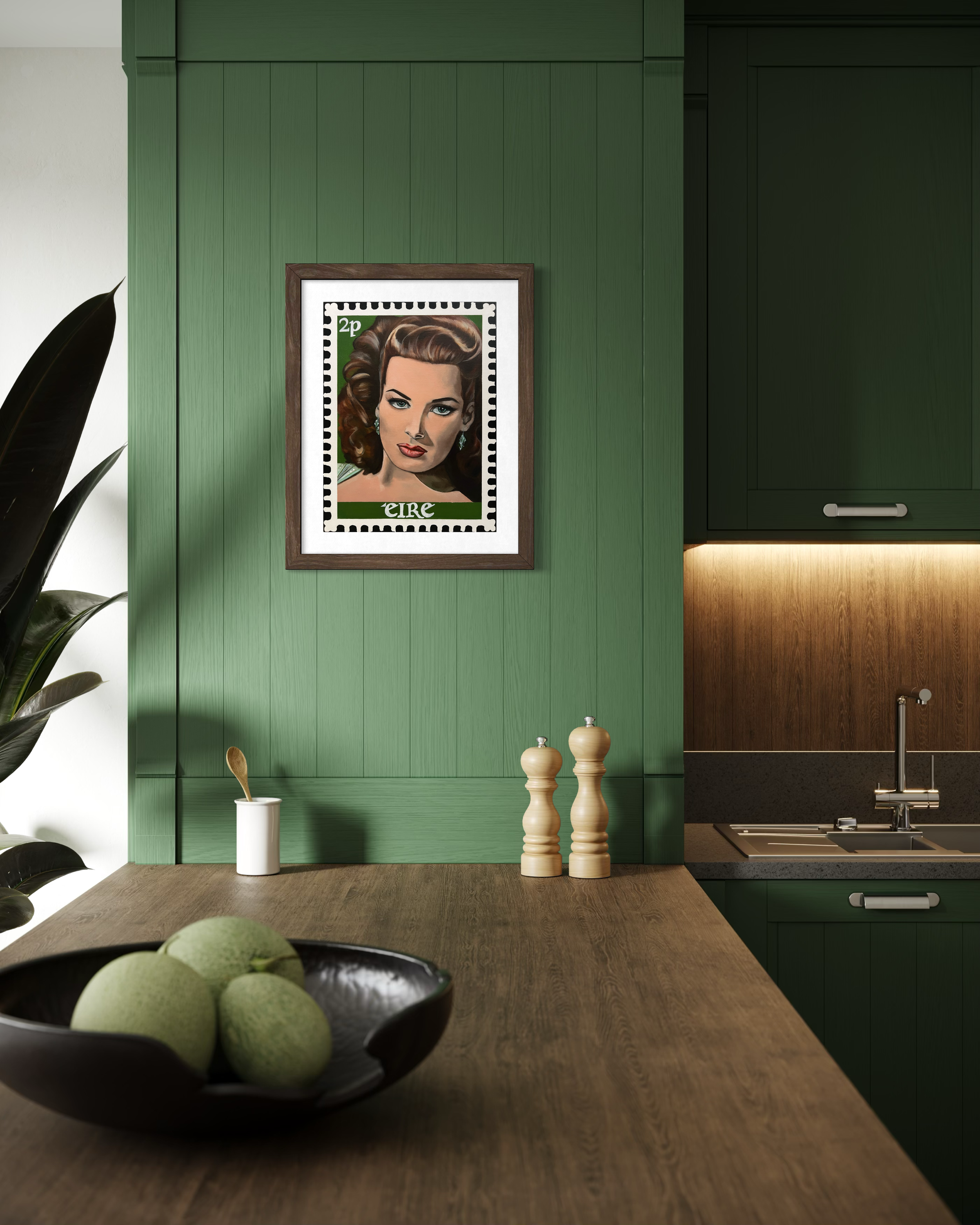 3.	Framed printed portrait of the iconic actress, Maureen O'Hara, as a vintage Irish postage stamp, inspired by Hollywood glamour and 1950s pin-up art, on green wall.PNG