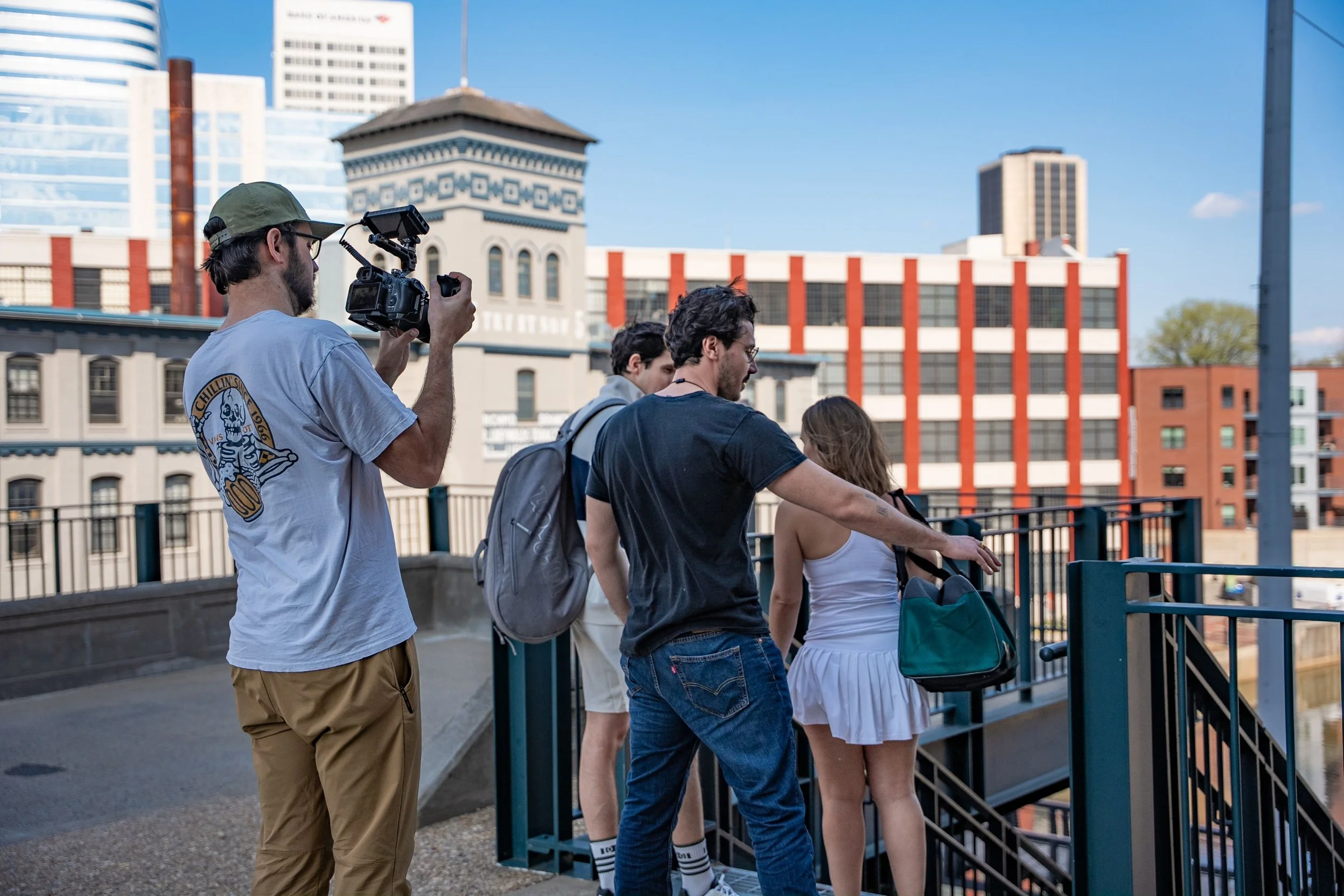 Francesco Basti directing talent for a brand social commercial in Richmond, VA. Patrick Johnson, cinematographer operating the camera for Daydream Studio.