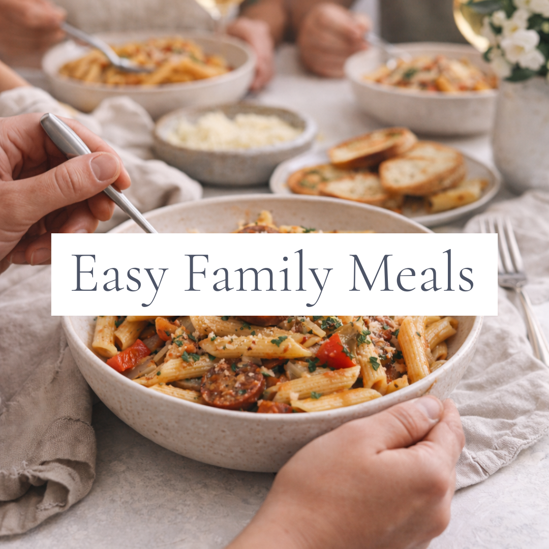 Bowl of homemade pasta with garlic bread representing easy family meals, simple recipes, and weeknight dinner ideas.