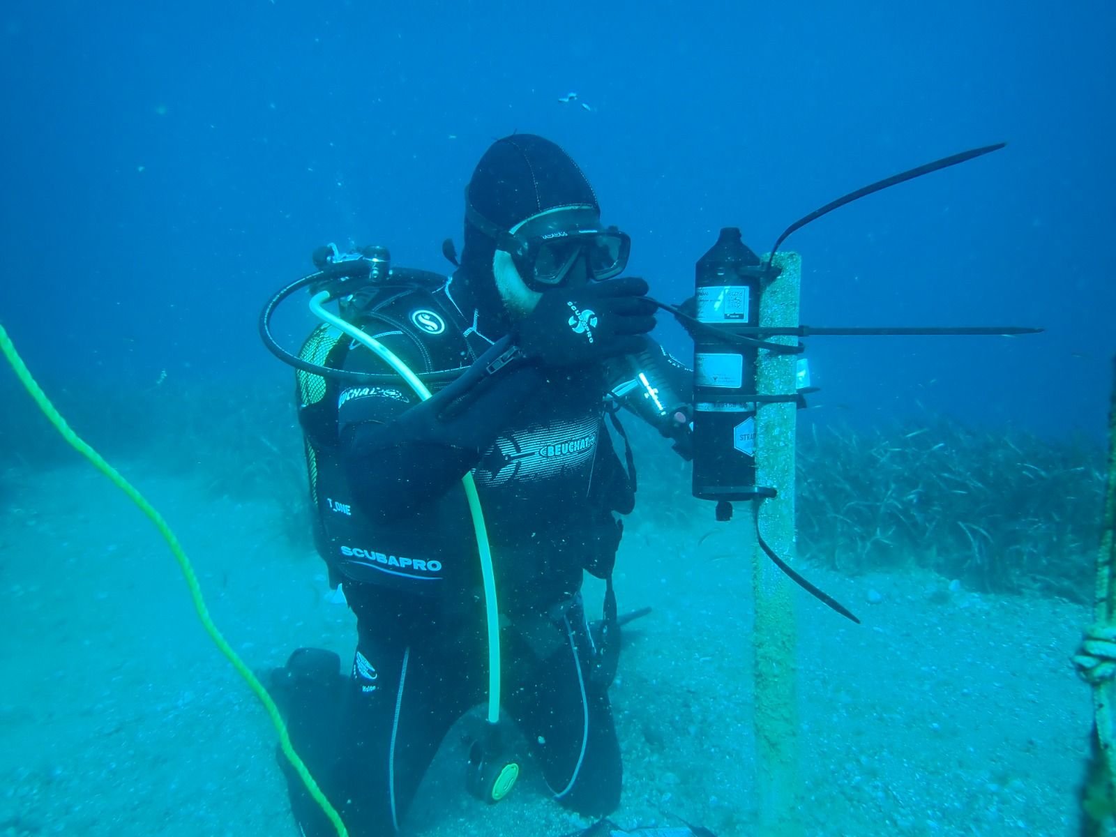Researcher installing receiver.jpg