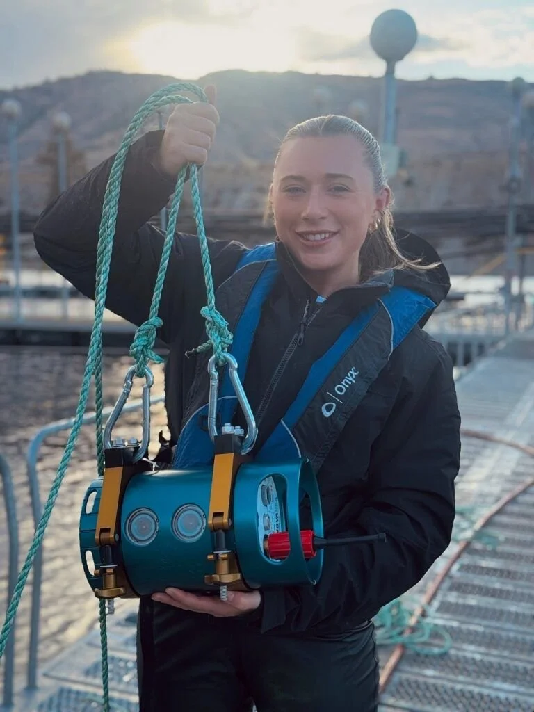 Innovasea employee with Camera.jpg