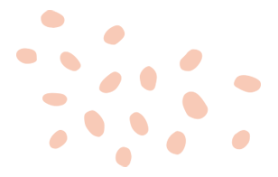 Multiple light pink oval-shaped objects scattered on a black background.