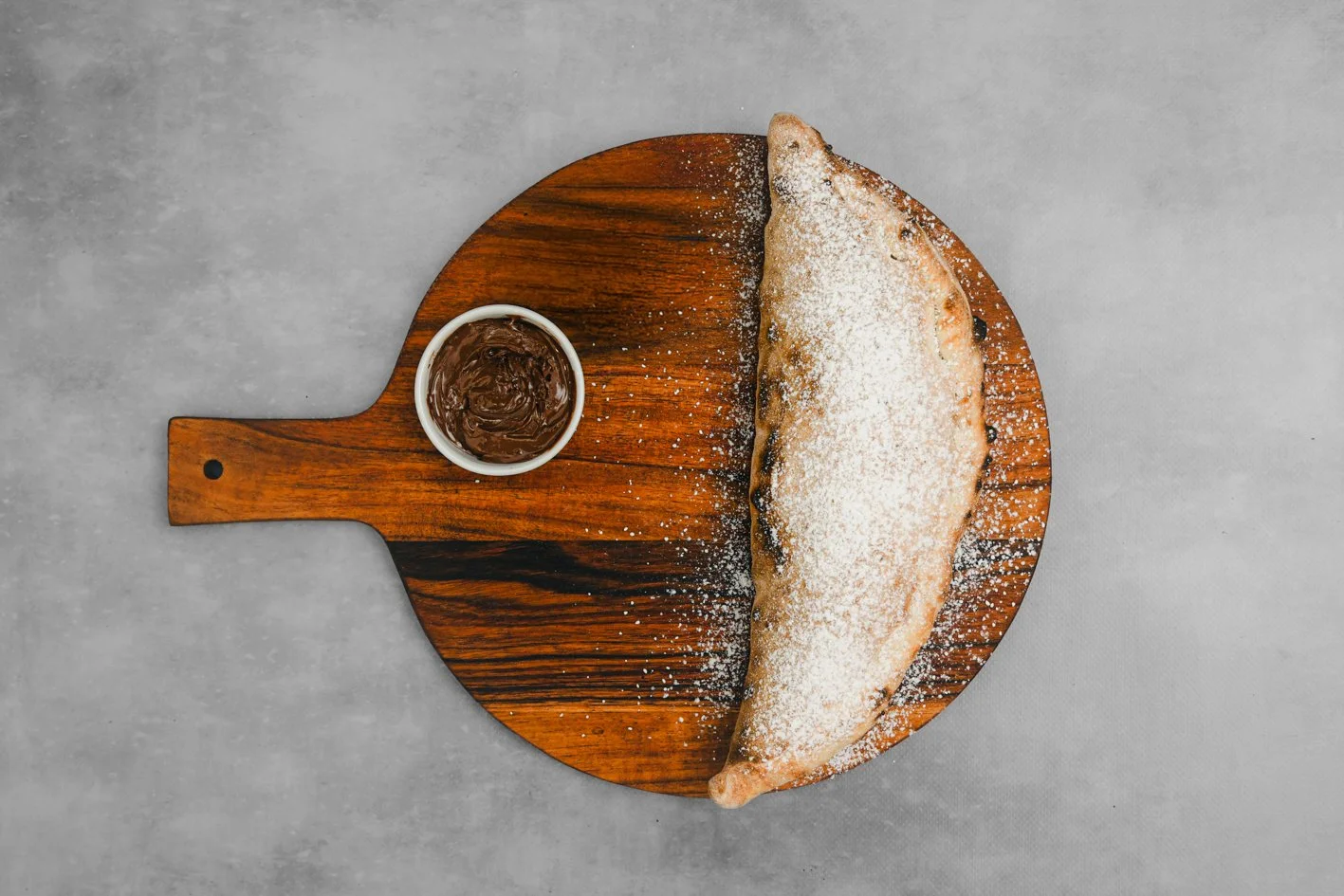 Nutella Calzone 
- Nutella, Icing Sugar