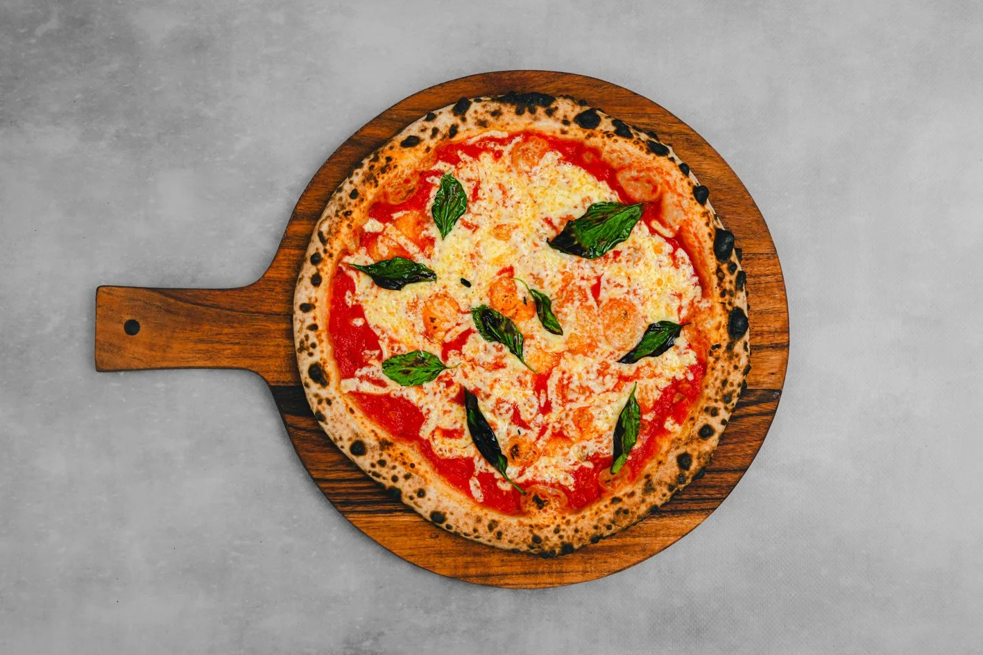 Vegan Margherita 
- Vegan Sauce, Vegan Cheese, Basil, Herb Oil - surcharge applies 