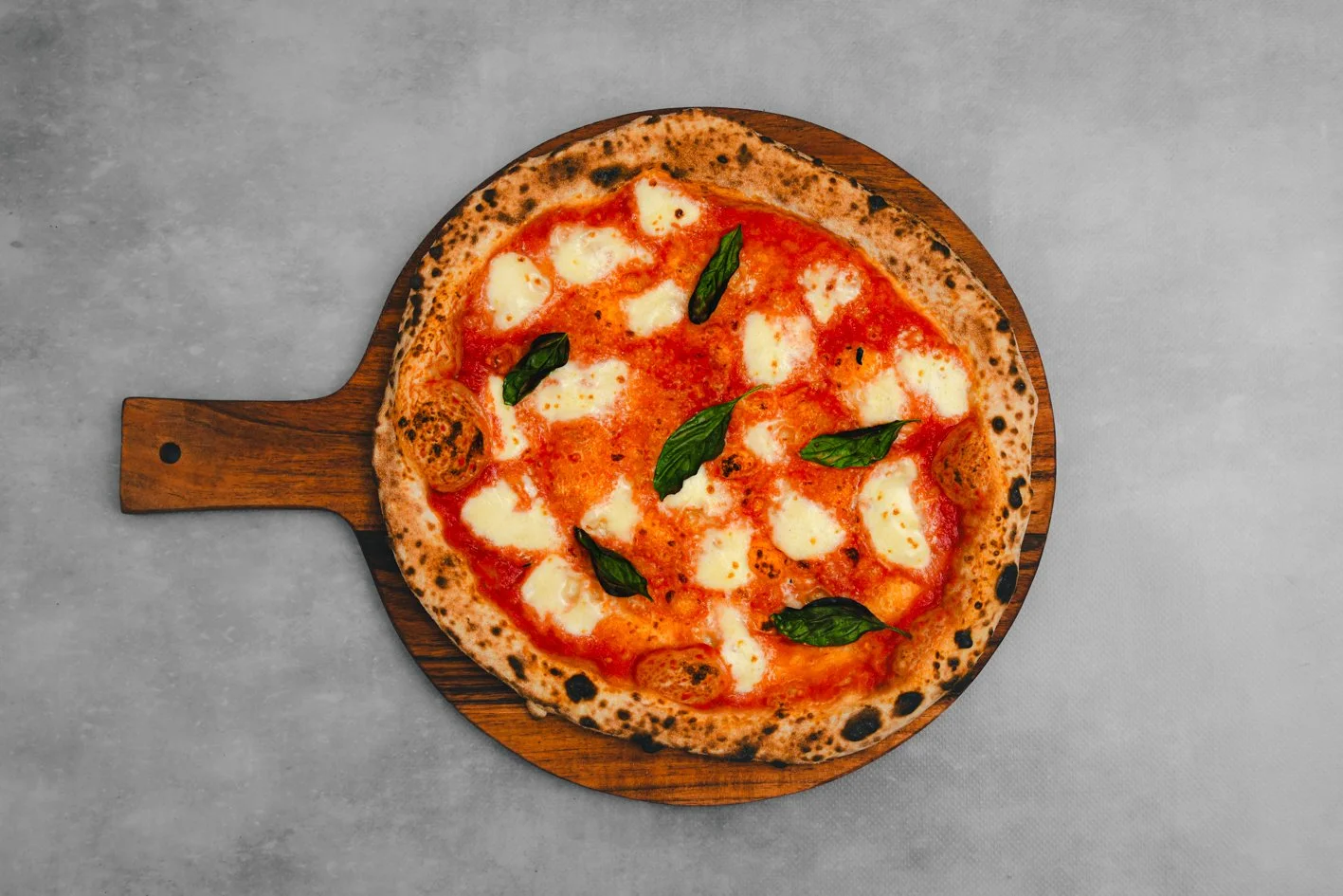 Margherita 
- Sauce, Fior Di Latte, Basil, Herb Oil 