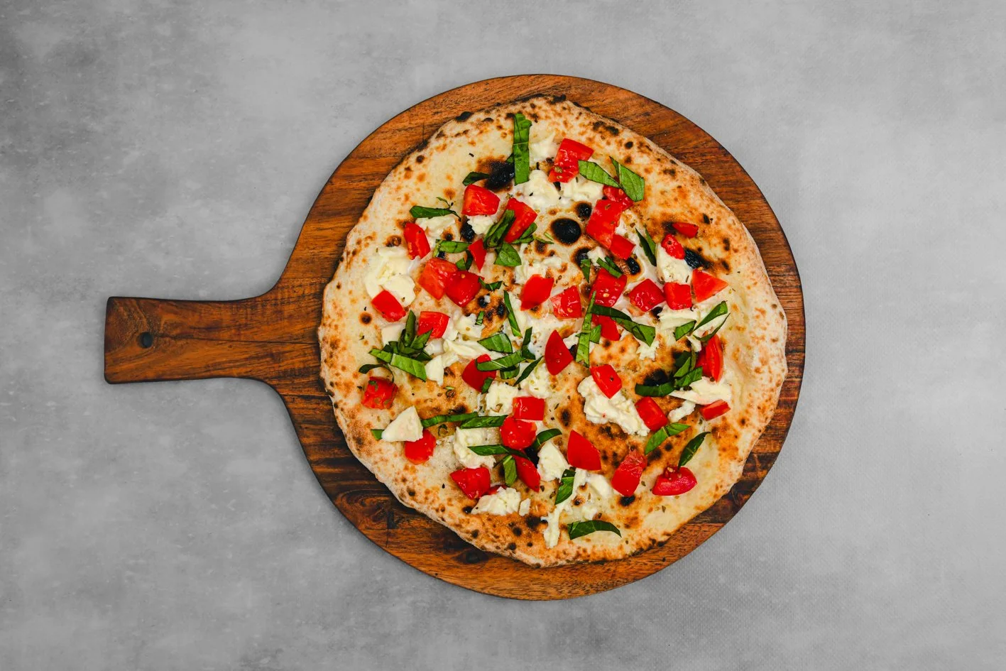 Schiacciata 
- Sliced Tomato, Fior Di Latte, Oregano, Herb Oil (in Bianco / Oil Based) 